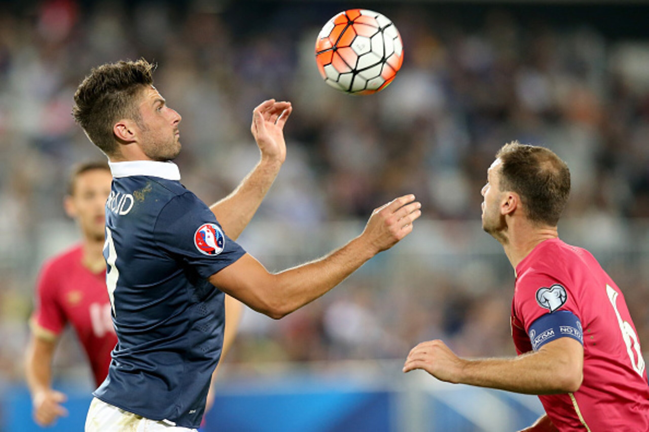 BORDEAUX, FRANCE - SEPTEMBER 07: Olivier Giroud of France and Branislav Ivanovic of Serbia during the International Friendly game between France and Serbia during on September 7, 2015 in Bordeaux, France.  (Photo by Romain Perrocheau/Getty Images)