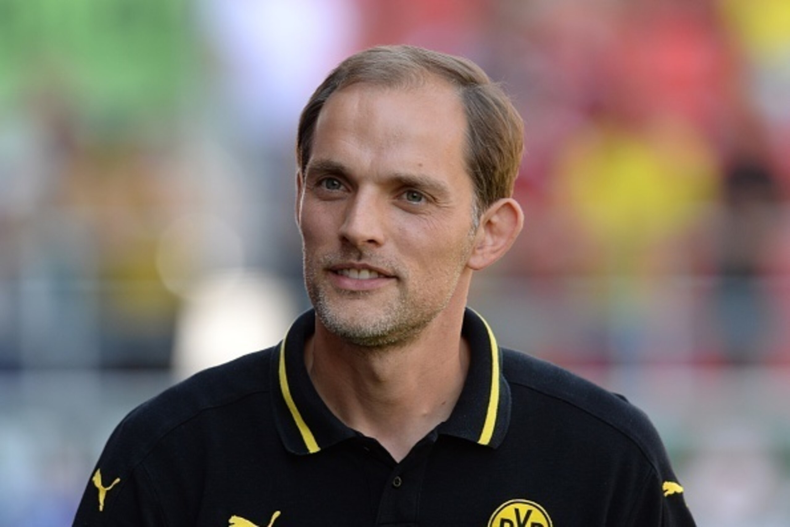 Dortmund's headcoach Thomas Tuchel looks on ahead of the German first division Bundesliga football match FC Ingolstadt 04 vs Borussia Dortmund, on August 23, 2015 in Ingolstadt, southern Germany.   AFP PHOTO / CHRISTOF STACHE

RESTRICTIONS: DURING MATCH T