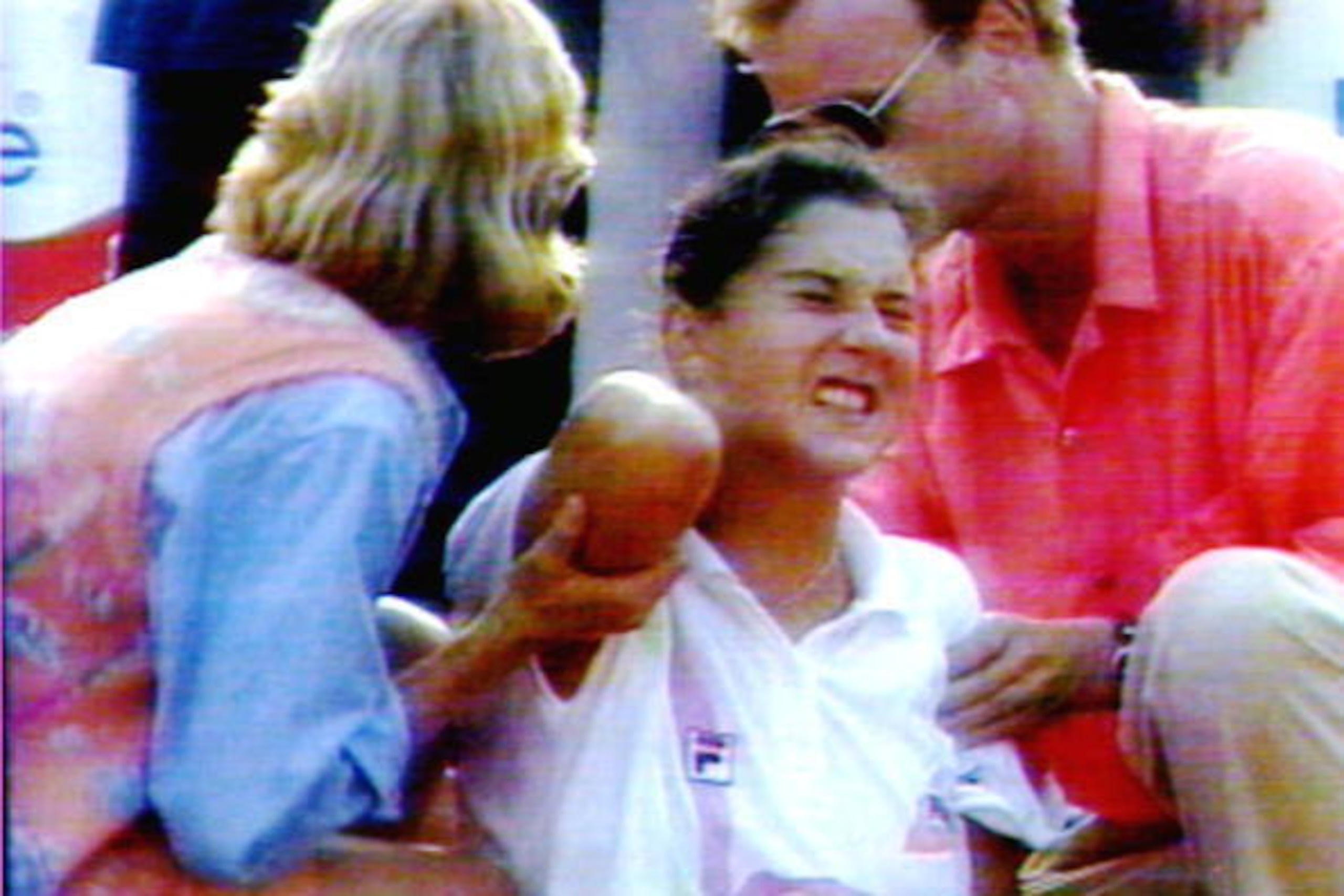 HAMBURG, GERMANY - APRIL 30:  World number one tennis player Monica Seles (C) grimaces in pain after being stabbed in the back by an unidentified spectator 30 April 1993. The injury was reportedly not life-threatening.  (Photo credit should read PA/AFP/Ge
