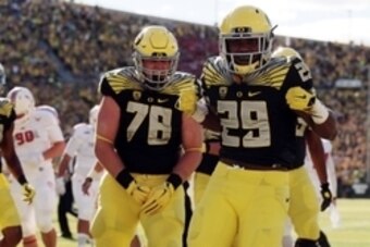 Sep 5, 2015; Eugene, OR, USA; Oregon Ducks running back Kani Benoit (29) celebrates a touchdown in the first quarter against the Eastern Washington Eagles at Autzen Stadium. Mandatory Credit: Scott Olmos-USA TODAY Sports