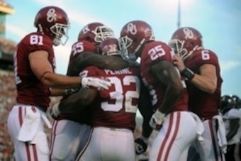 Sep 5, 2015; Norman, OK, USA; The Oklahoma Sooners celebrate after a touchdown against the Akron Zips during the third quarter at Gaylord Family - Oklahoma Memorial Stadium. Mandatory Credit: Mark D. Smith-USA TODAY Sports