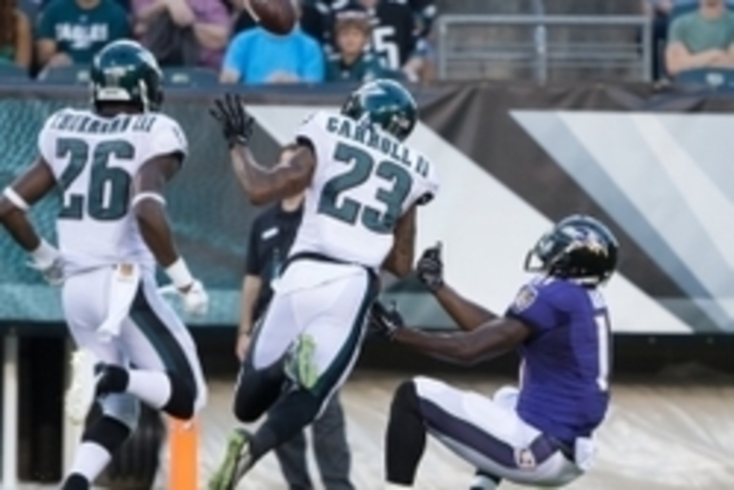 Aug 22, 2015; Philadelphia, PA, USA; Philadelphia Eagles cornerback Nolan Carroll (23) intercepts the ball in front of Baltimore Ravens wide receiver Kamar Aiken (11) during the first quarter at Lincoln Financial Field. Mandatory Credit: Bill Streicher-US