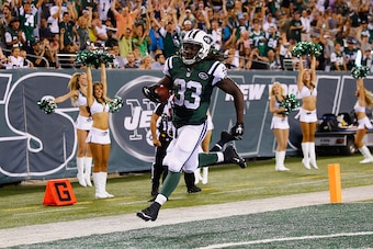 EAST RUTHERFORD, NJ - AUGUST 21:  Chris Ivory #33 of the New York Jets scores a touchdown against the Atlanta Falcons in the second quarter during their pre season game at MetLife Stadium on August 21, 2015 in East Rutherford, New Jersey.  (Photo by Al Be