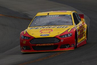 WATKINS GLEN, NY - AUGUST 08: Joey Logano, driver of the #22 Shell Pennzoil Ford, races during qualifying for the NASCAR Sprint Cup Series Cheez-It 355 at Watkins Glen International on August 8, 2015 in Watkins Glen, New York.  (Photo by Matt Sullivan/Get