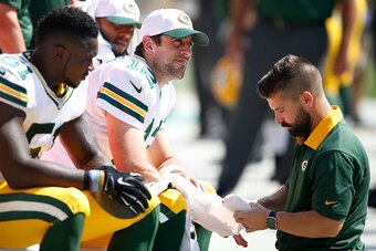 PITTSBURGH, PA - AUGUST 23: Aaron Rodgers #12 of the Green Bay Packers looks on during a preseason game against the Pittsburgh Steelers at Heinz Field on August 23, 2015 in Pittsburgh, Pennsylvania. The Steelers defeated the Packers 24-19. (Photo by Joe R