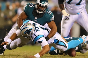 PHILADELPHIA, PA - NOVEMBER 10: Brandon Graham #55 of the Philadelphia Eagles sacks and forces a fumble on Cam Newton #1 of the Carolina Panthers on November 10, 2014 at Lincoln Financial Field in Philadelphia, Pennsylvania. (Photo by Elsa/Getty Images)
