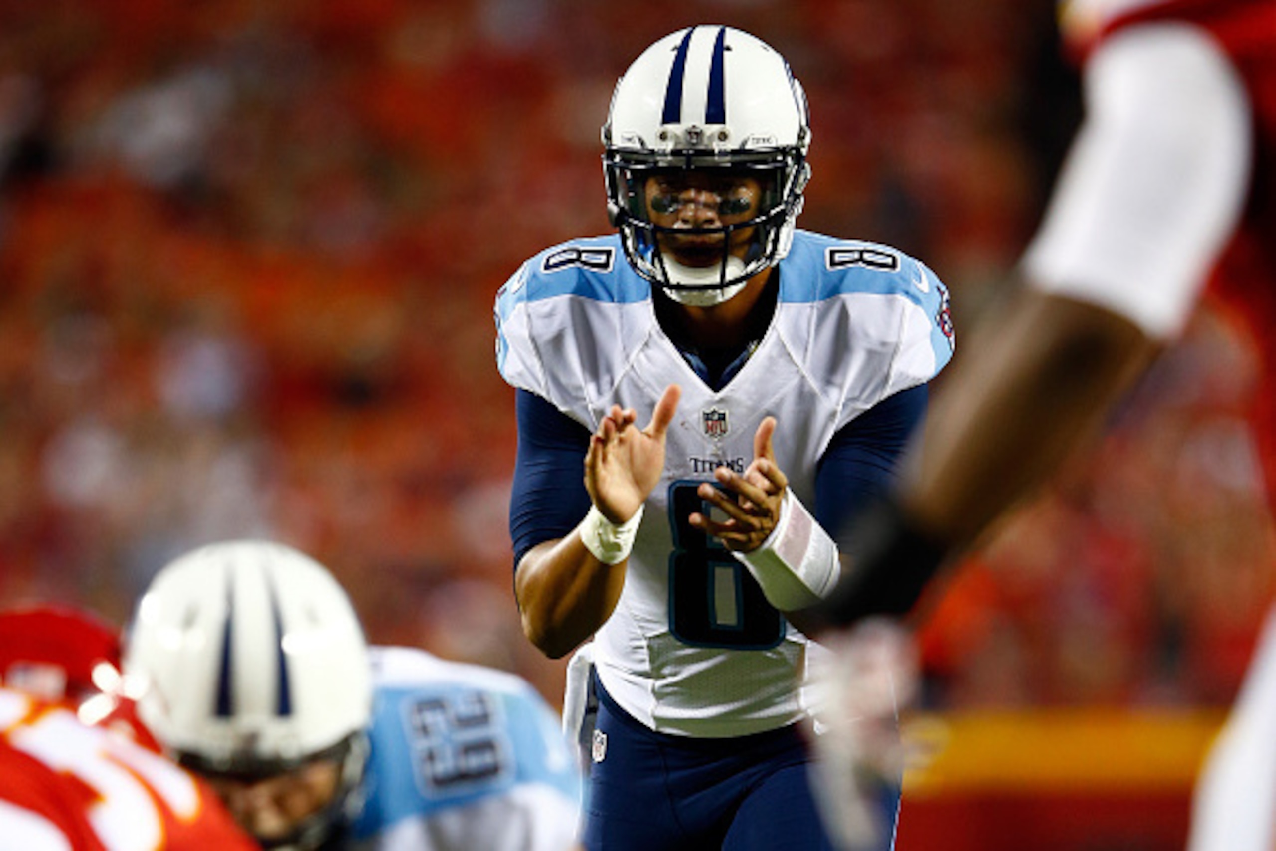 KANSAS CITY, MO - AUGUST 28:  Quarterback Marcus Mariota #8 of the Tennessee Titans in action during the preseason game against the Kansas City Chiefs at Arrowhead Stadium on August 28, 2015 in Kansas City, Missouri.  (Photo by Jamie Squire/Getty Images)