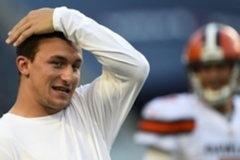 Sep 3, 2015; Chicago, IL, USA; Cleveland Browns quarterback Johnny Manziel (2) stretches before the game against the Chicago Bears at Soldier Field. Mandatory Credit: Mike DiNovo-USA TODAY Sports