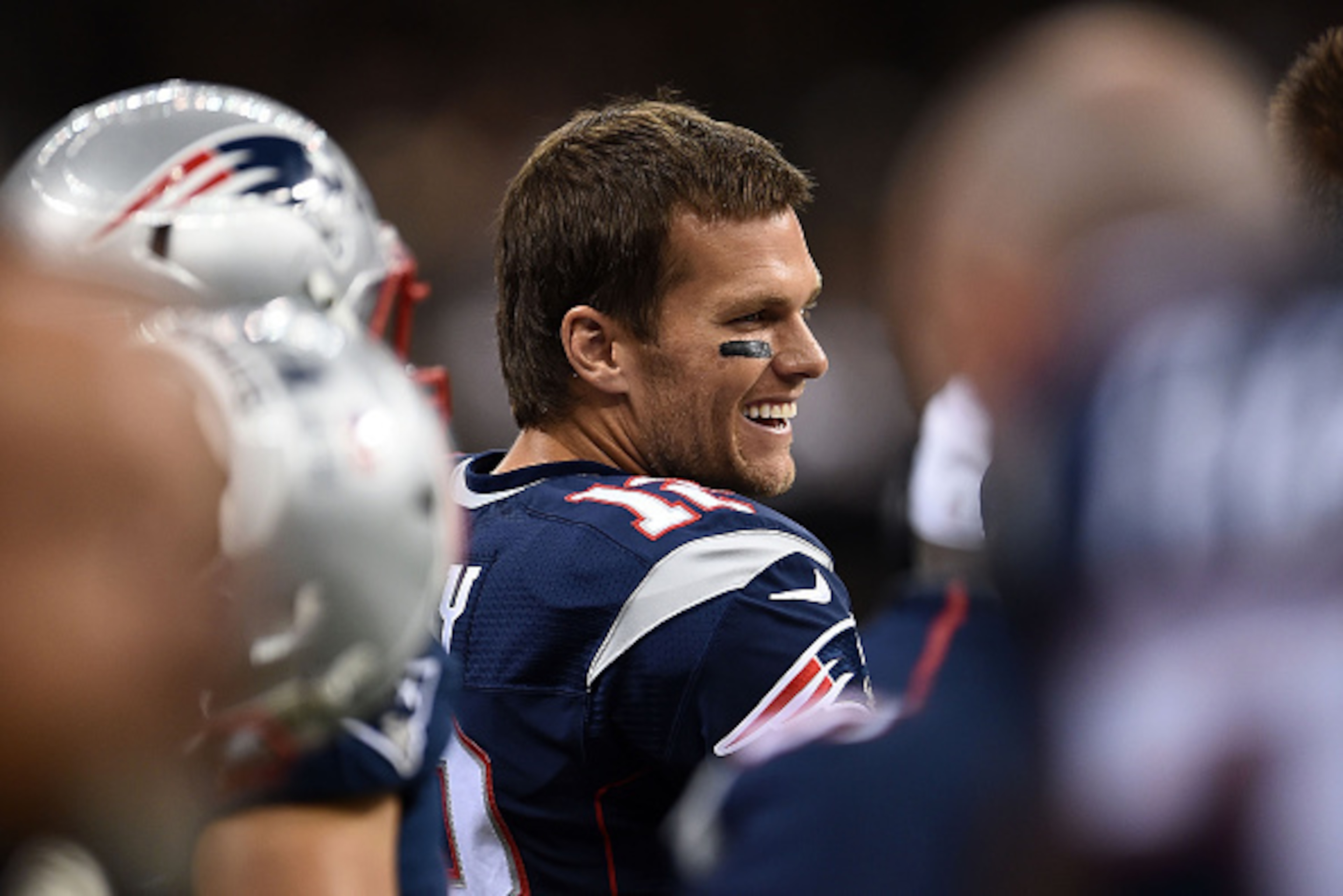 NEW ORLEANS, LA - AUGUST 22:  Tom Brady #12 of the New England Patriots watches action during a preseason game against the New Orleans Saints at the Mercedes-Benz Superdome on August 22, 2015 in New Orleans, Louisiana.  (Photo by Stacy Revere/Getty Images