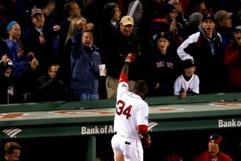 BOSTON, MA - OCTOBER 23:  David Ortiz #34 of the Boston Red Sox celebrates after hitting a home run in the seventh inning against the St. Louis Cardinals during Game One of the 2013 World Series at Fenway Park on October 23, 2013 in Boston, Massachusetts.