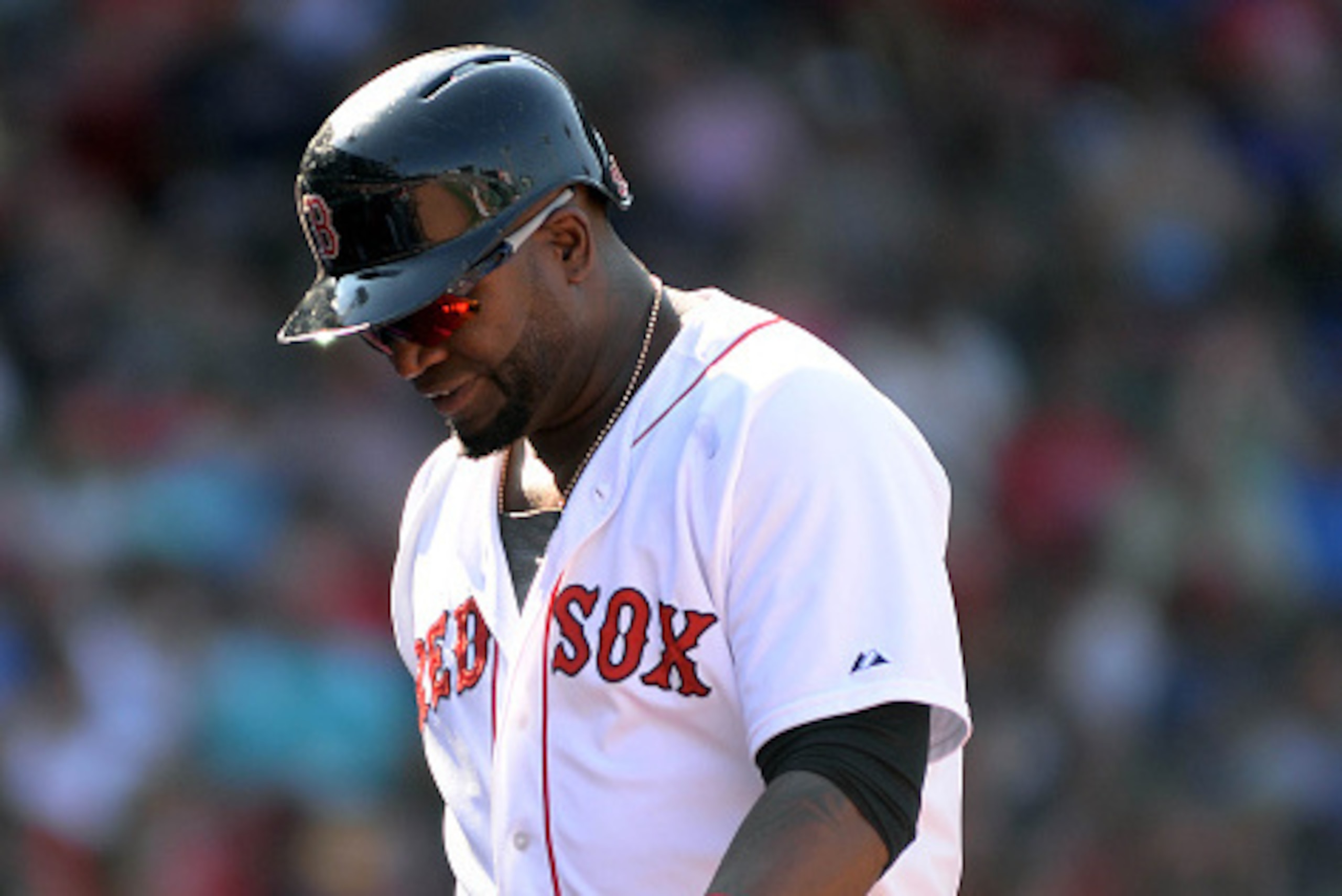 BOSTON, MA - SEPTEMBER 7: David Ortiz #34 of the Boston Red Sox  walks back to the dugout after striking out in the sixth inning against the Toronto Blue Jays at Fenway Park on September 7, 2015 in Boston, Massachusetts. (Photo by Darren McCollester/Getty