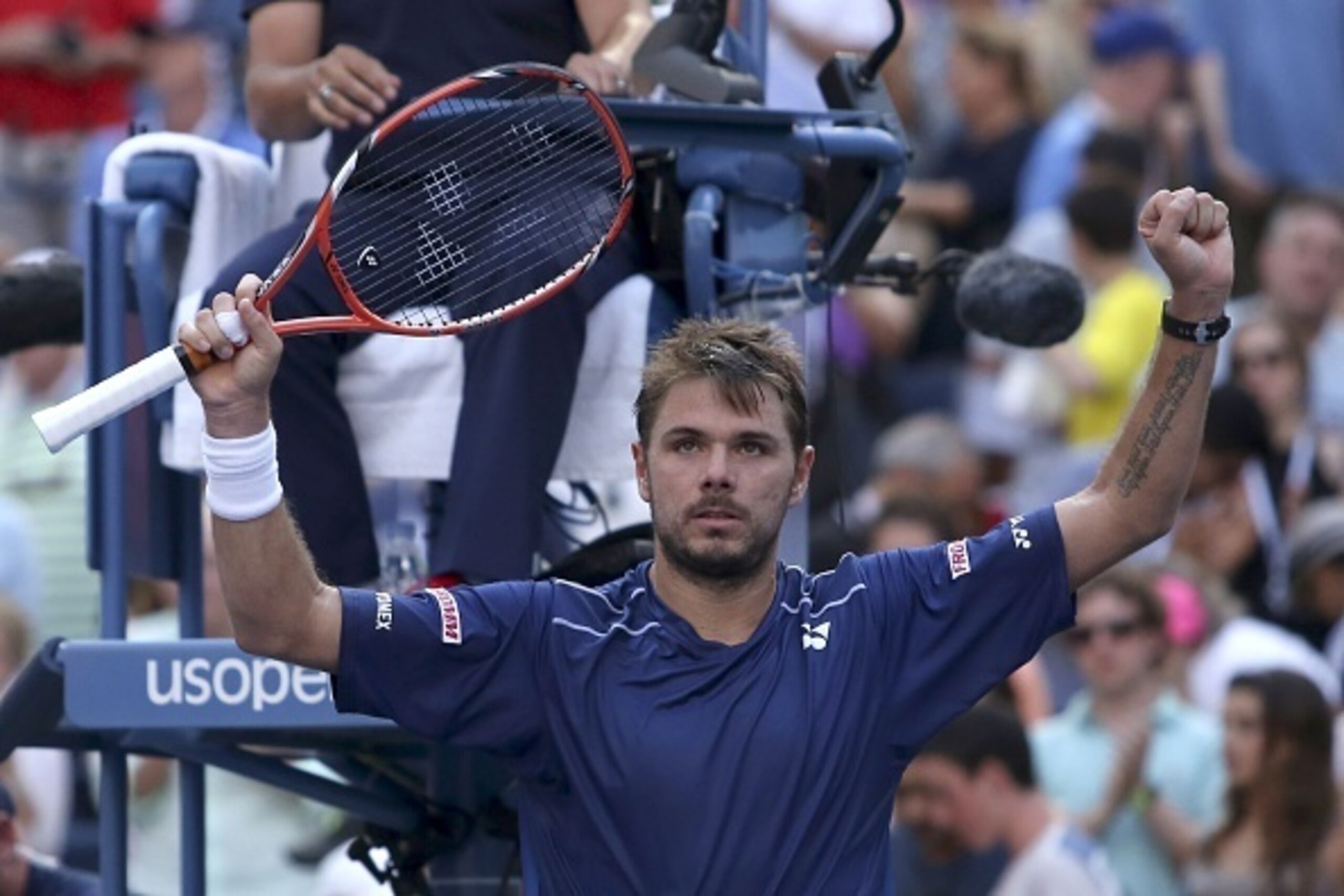 Stan Wawrinka of Switzerland celebrates after defeating Donald Young of the US during their 2015 US Open Men's Singles round 4 match at the USTA Billie Jean King National Tennis Center September 7, 2015 in New York. AFP PHOTO/KENA BETANCUR        (Photo c