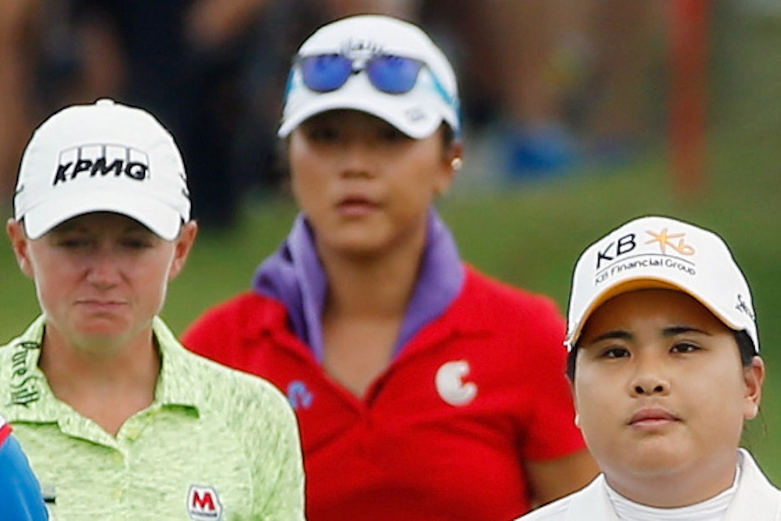 SINGAPORE - MARCH 08:  Rolex World Ranked 1-3 players Inbee Park of South Korea, Stacy Lewis of the United States and  Lydia Ko of New Zealand walk on the 14th hole during the final round of the HSBC Women's Champions at the Sentosa Golf Club on March 8, 