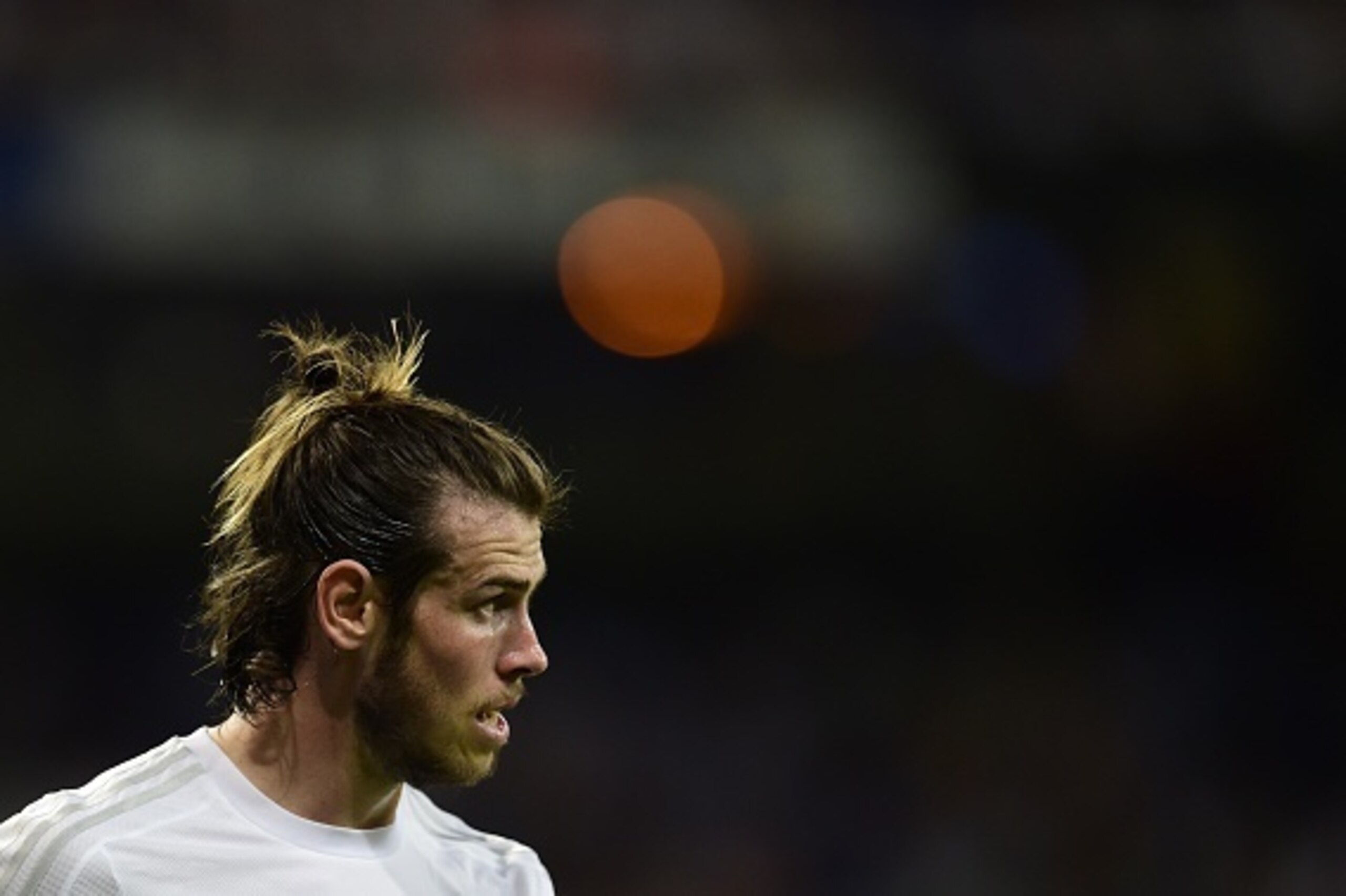 Real Madrid's Welsh forward Gareth Bale looks on during the Spanish league football match Real Madrid CF vs Real Betis Balompie at the Santiago Bernabeu stadium in Madrid on August 29, 2015.   AFP PHOTO/ PIERRE-PHILIPPE MARCOU        (Photo credit should 