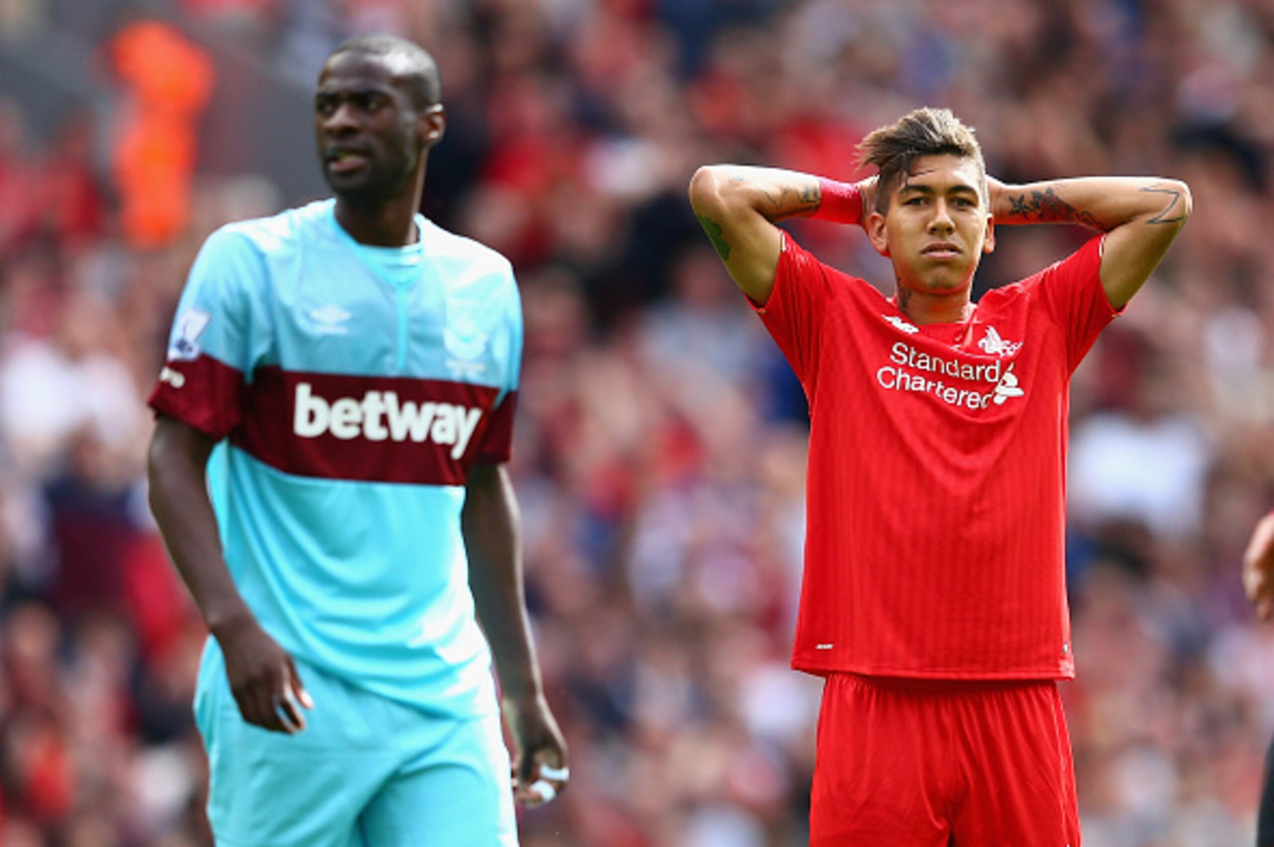 LIVERPOOL, ENGLAND - AUGUST 29:  Roberto Firmino of Liverpool rues a missed opportunity during the Barclays Premier League match between Liverpool and West Ham United at Anfield on August 29, 2015 in Liverpool, United Kingdom.  (Photo by Clive Mason/Getty