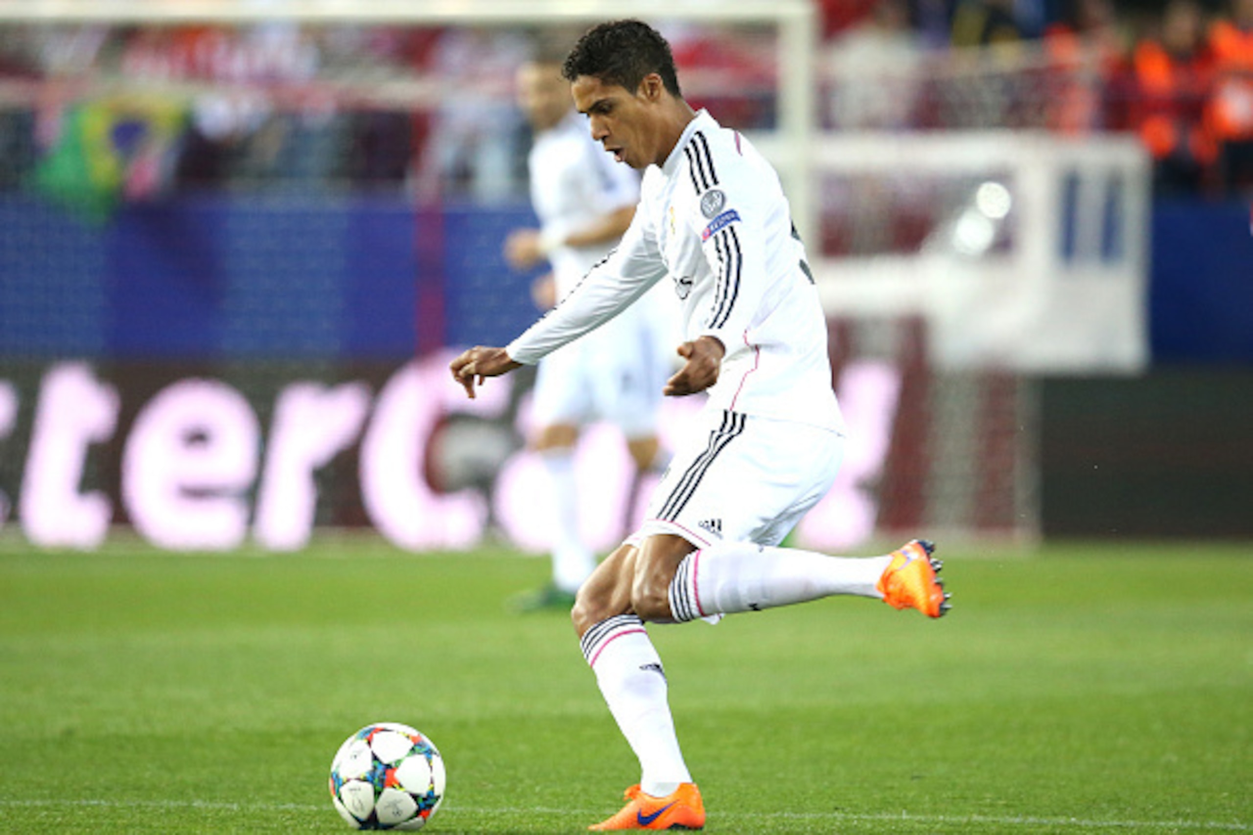 MADRID, SPAIN - APRIL 14:  Raphael Varane of Real Madrid in action during the UEFA Champions League Quarter Final First Leg match between Atletico Madrid and Real Madrid at Vicente Calderon stadium on April 14, 2015 in Madrid, Spain. (Photo by Jean Catuff