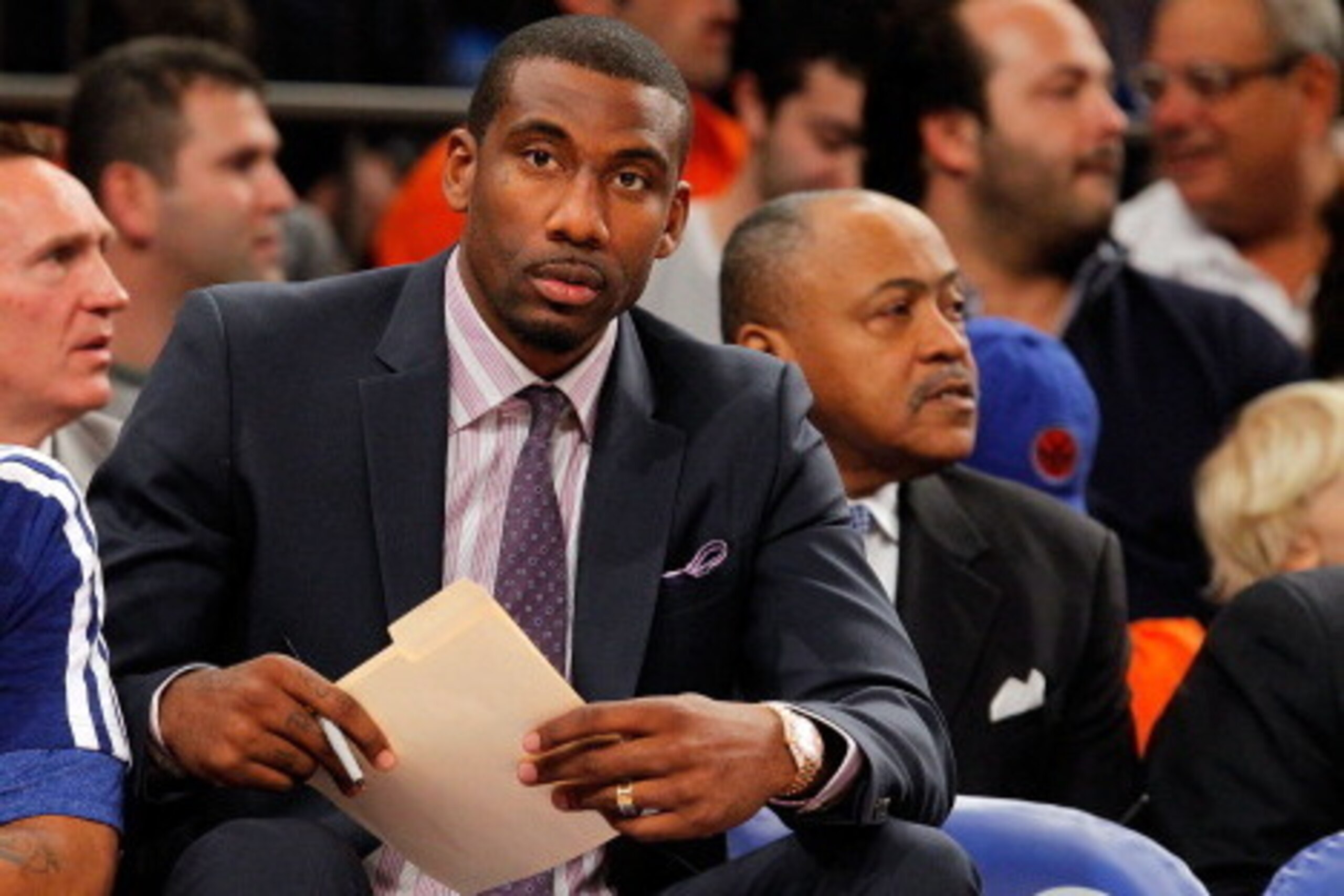 NEW YORK, NY - APRIL 20:  (NEW YORK DAILIES OUT)    Injured Amar'e Stoudemire #1 of the New York Knicks looks on from the bench against the Boston Celtics during Game One of the Eastern Conference Quarterfinals of the 2013 NBA Playoffs on April 20, 2013 a