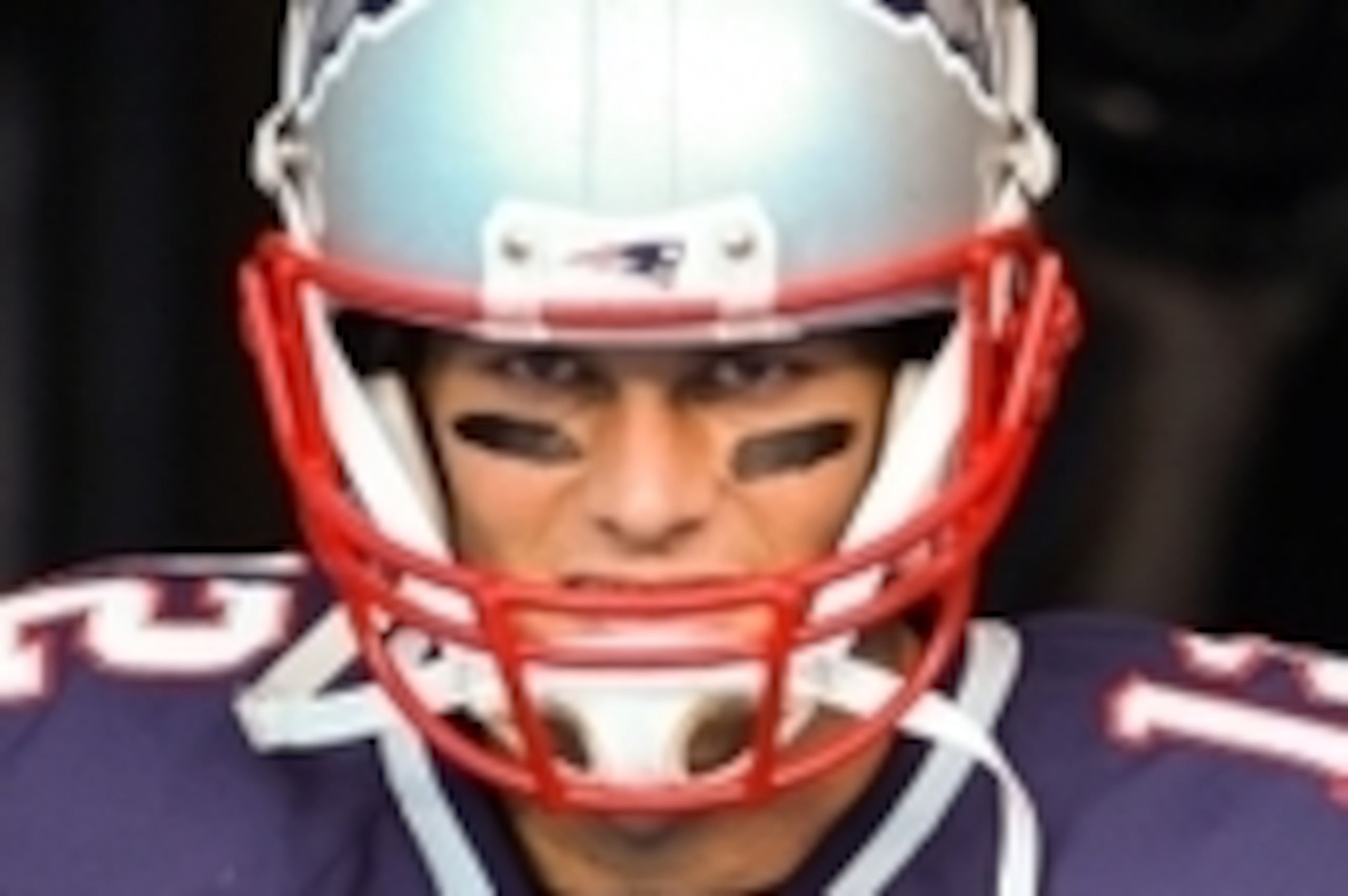Aug 28, 2015; Charlotte, NC, USA; New England Patriots quarterback Tom Brady (12) emerges from the tunnel during pre game warm ups at Bank of America Stadium. Mandatory Credit: Jim Dedmon-USA TODAY Sports