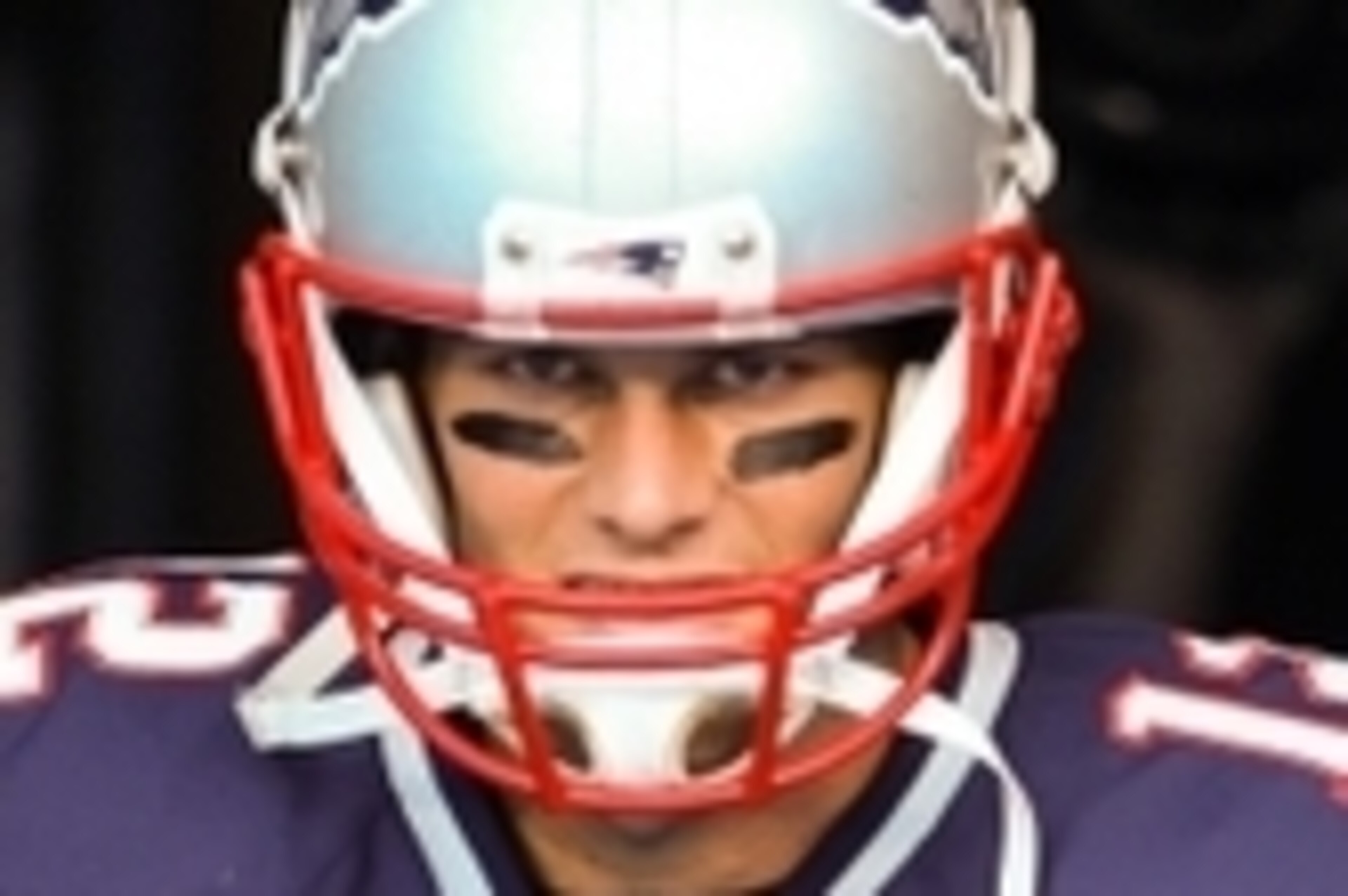 Aug 28, 2015; Charlotte, NC, USA; New England Patriots quarterback Tom Brady (12) emerges from the tunnel during pre game warm ups at Bank of America Stadium. Mandatory Credit: Jim Dedmon-USA TODAY Sports