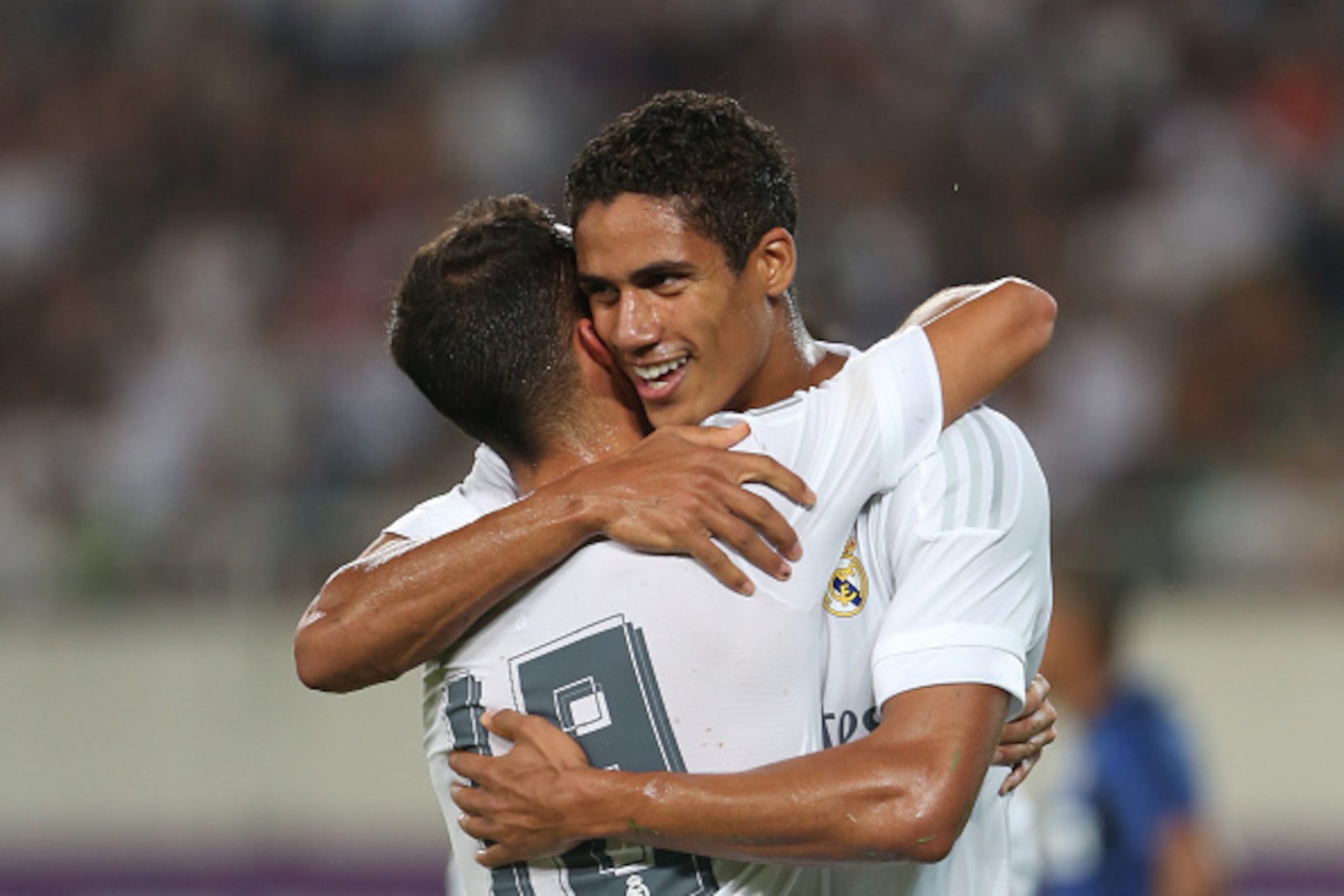 GUANGZHOU, CHINA - JULY 27: Varane of Real Madrid celebrates his goal with his teammate Lucas Vazquez during the match of International Champions Cup match between Real Madrid and FC Internazionale at Tianhe Stadium on July 27, 2015 in Guangzhou, China. (