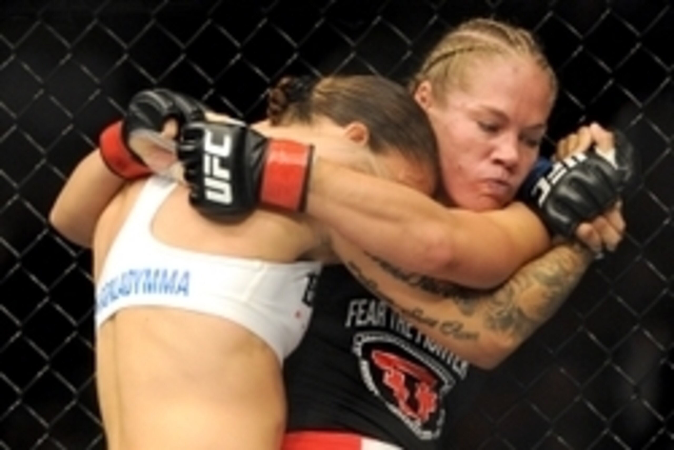 Jul 27, 2013; Seattle, WA, USA; Germaine de Randamine (blue tape) and Julie Kedzie (red tape) during their women's bantamweight bout at Key Arena. de Randamine won by split decision. Mandatory Credit: Jayne Kamin-Oncea-USA TODAY Sports Jul 27, 2013; Seattle, WA, USA; Germaine de Randamine (blue tape) and Julie Kedzie (red tape) during their women's bantamweight bout at Key Arena. de Randamine won by split decision. Mandatory Credit: Jayne Kamin-Oncea-USA TODAY Sports