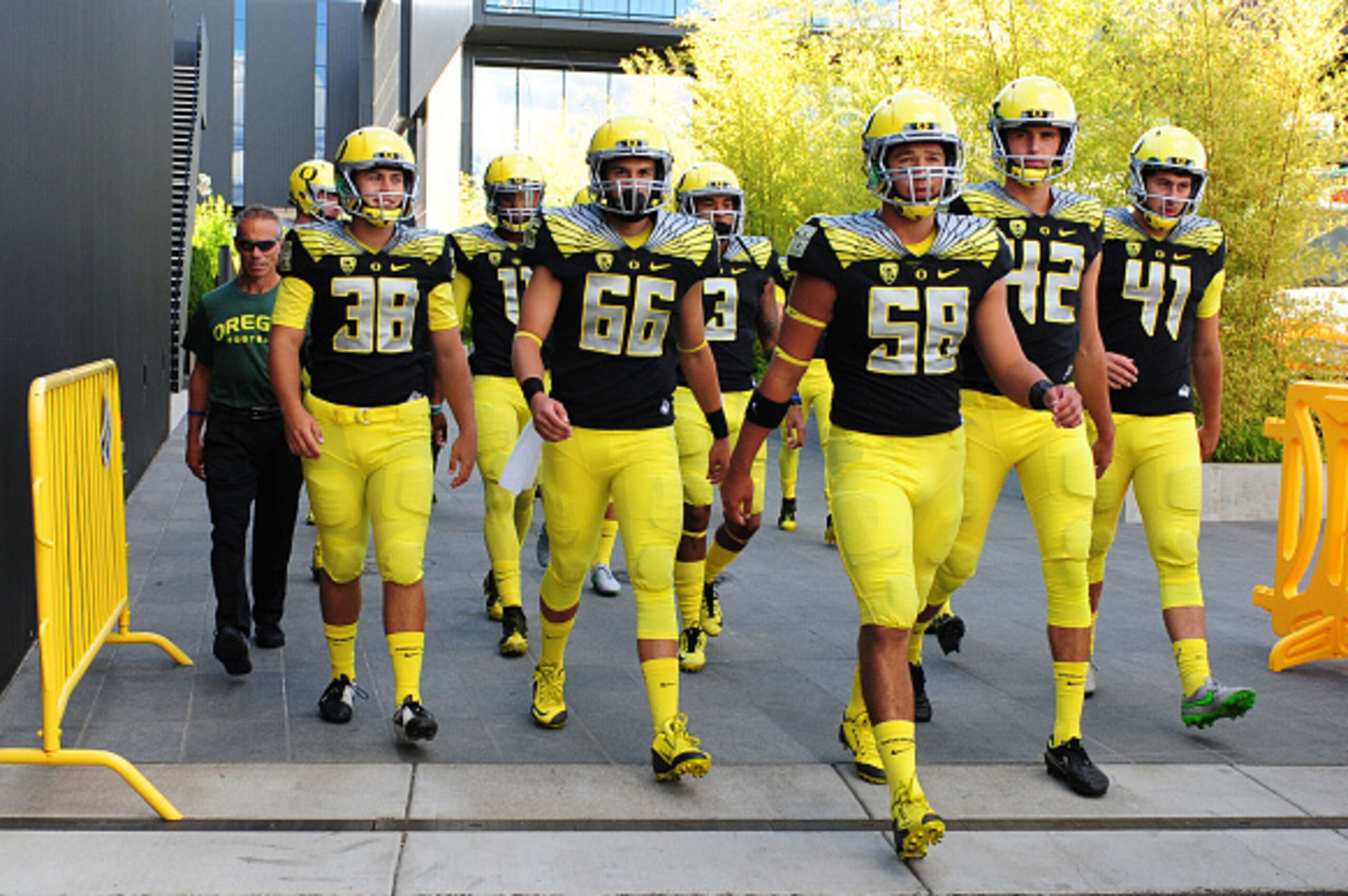 EUGENE, OR - SEPTEMBER 05: (C) Quarterback Vernon Adams Jr. of the Oregon Ducks walks out of the locker room with his teammates before the game against the Eastern Washington Eagle on September 5, 2015 in Eugene, Oregon. (Photo by Steve Dykes/Getty Images