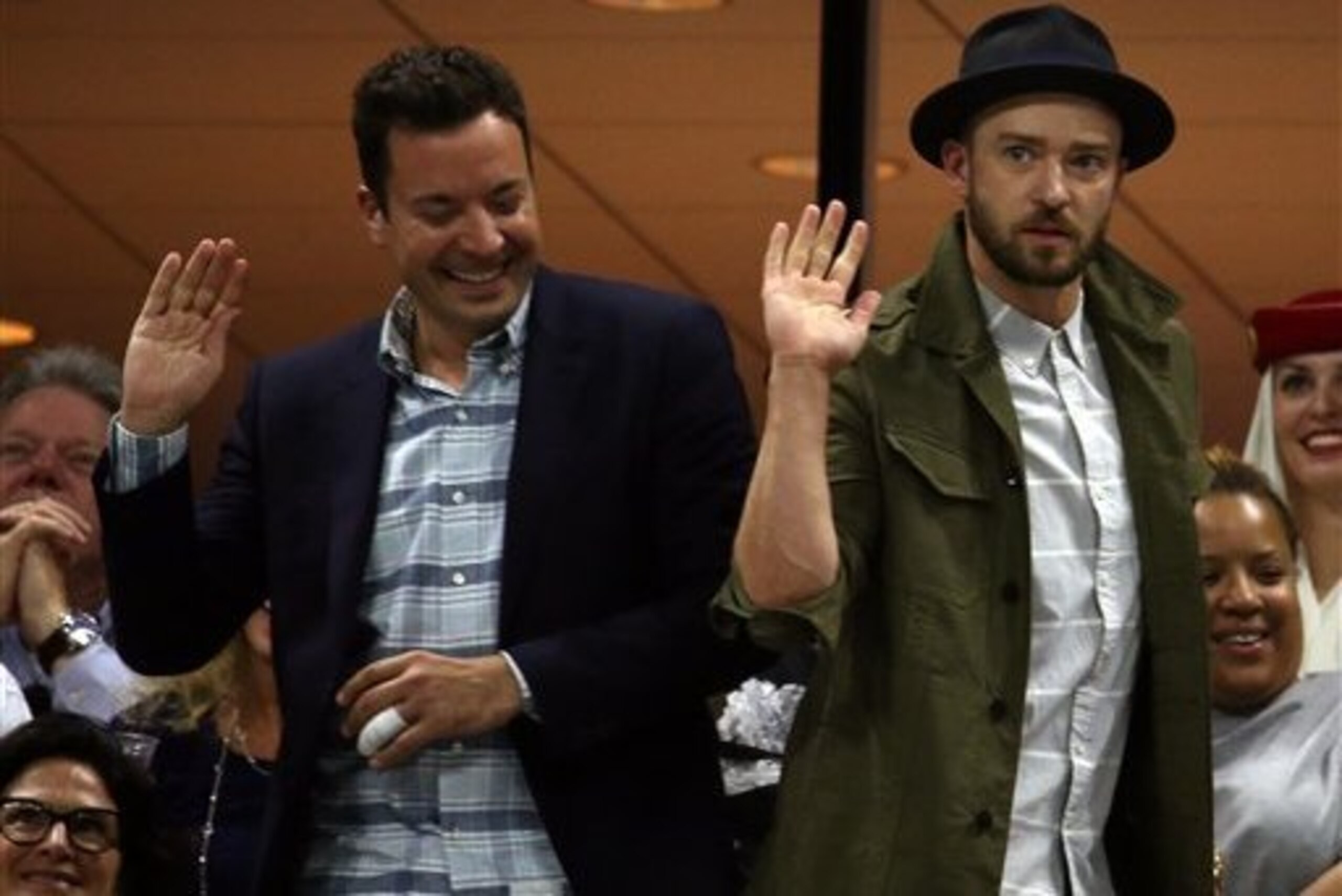 Jimmy Fallon and Justin Timberlake dance during Roger Federer's match at the U.S. Open.