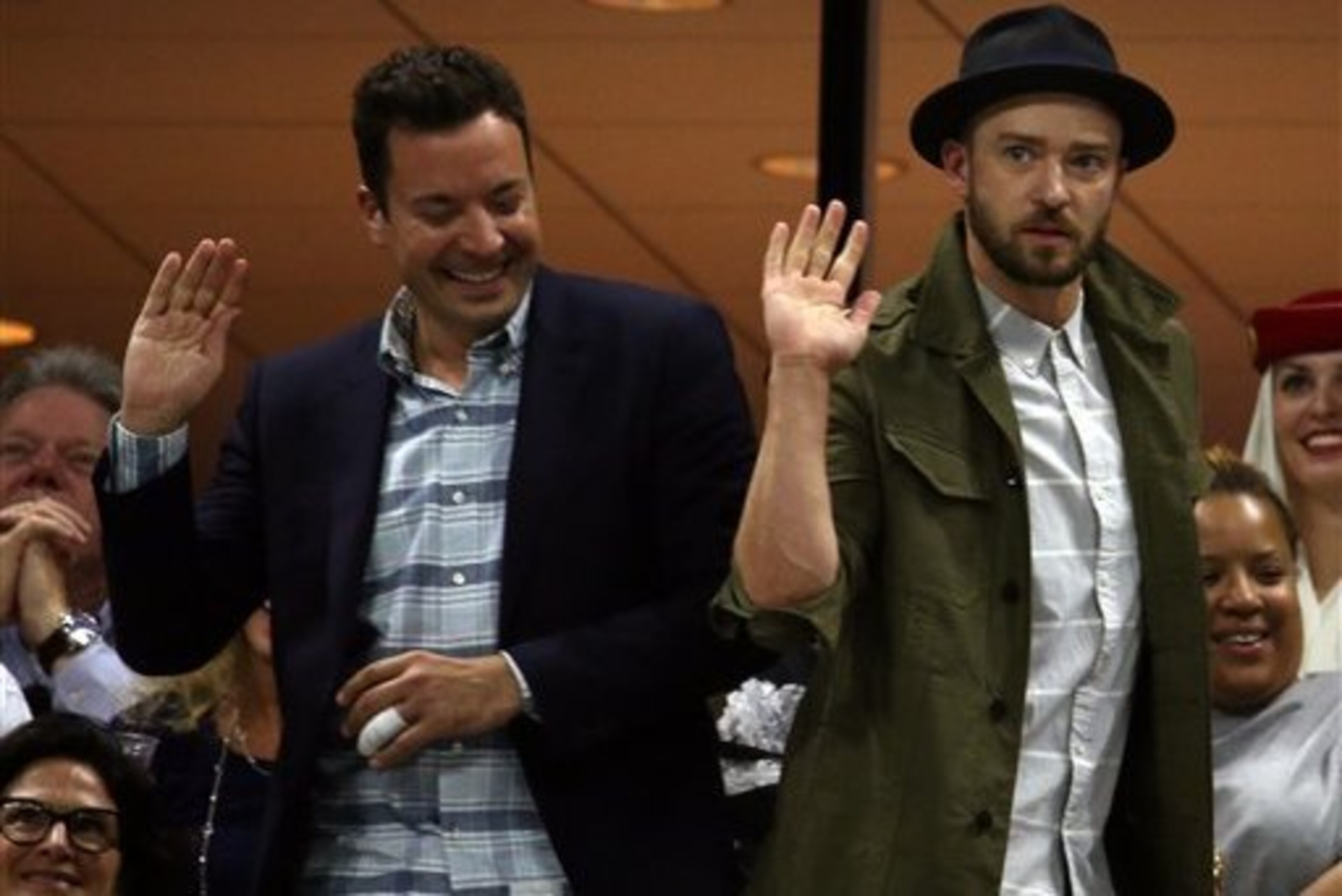 Jimmy Fallon and Justin Timberlake dance during Roger Federer's match at the U.S. Open.