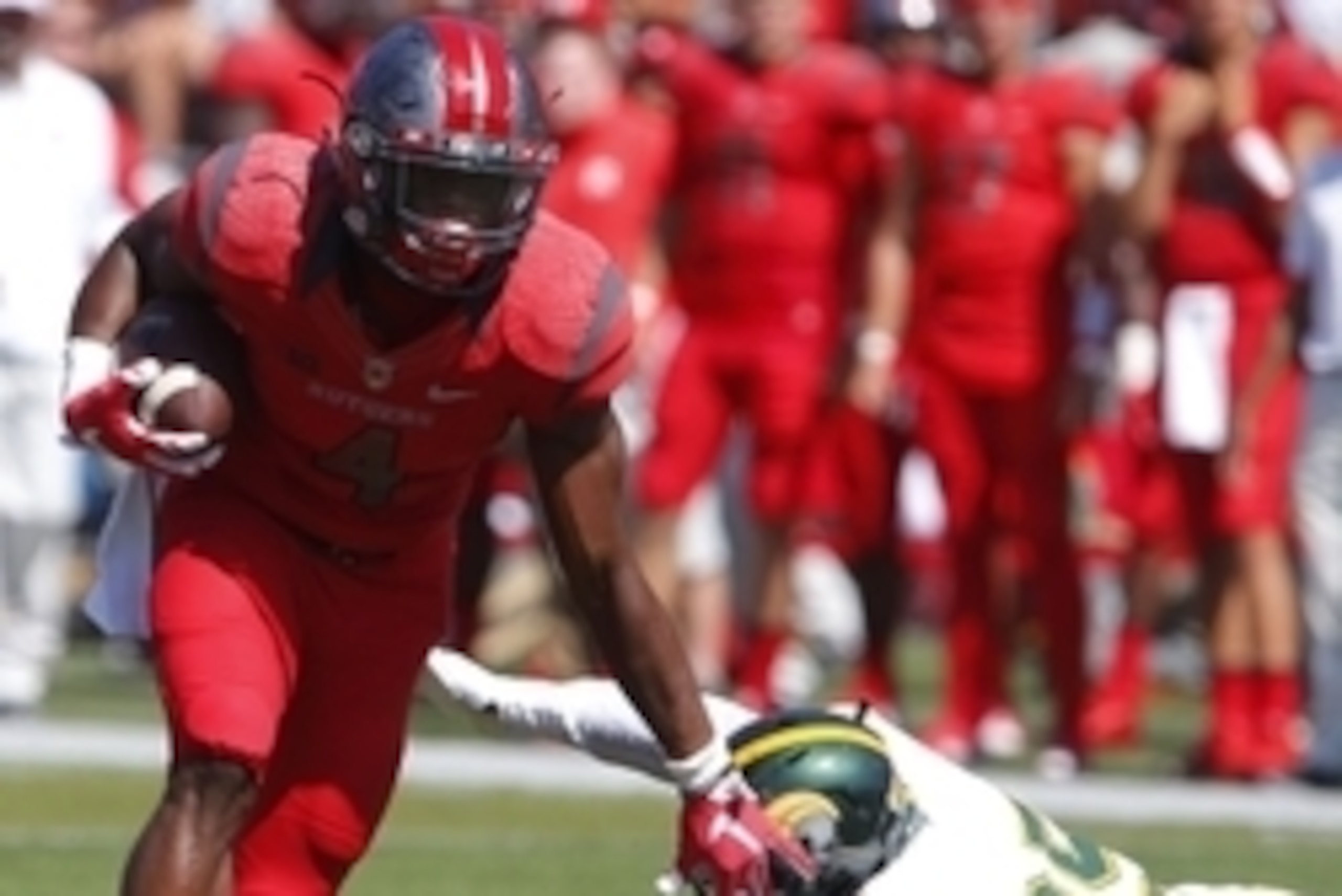 Sep 5, 2015; Piscataway, NJ, USA; Rutgers Scarlet Knights wide receiver Leonte Carroo (4) carries the ball past Norfolk State Spartans defensive back Onaje Bullen (35) during second half at High Points Solutions Stadium. Mandatory Credit: Noah K. Murray-U