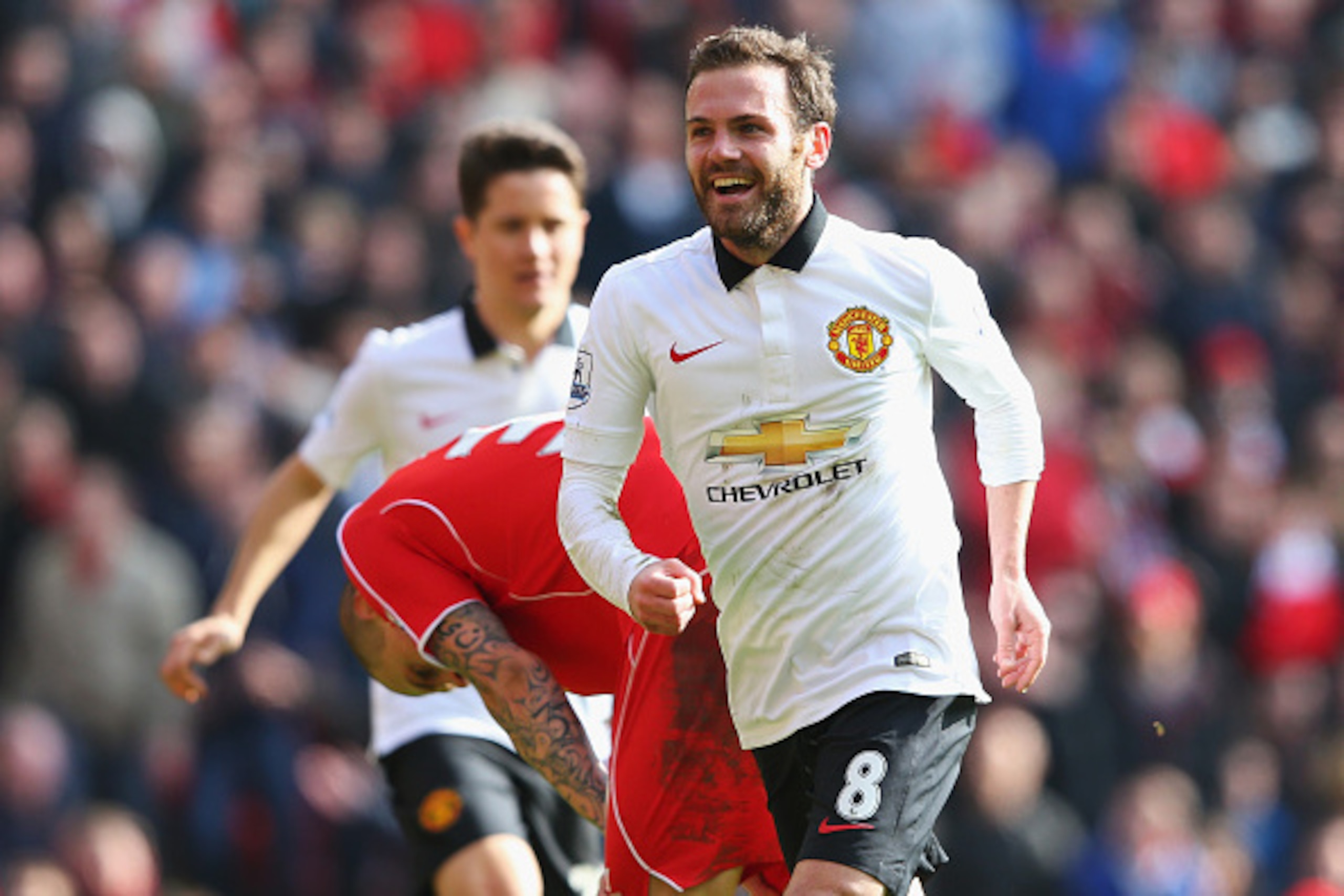 LIVERPOOL, ENGLAND - MARCH 22:  Juan Mata of Manchester United celebrates scoring his second goal during the Barclays Premier League match between Liverpool and Manchester United at Anfield on March 22, 2015 in Liverpool, England.  (Photo by Alex Livesey/