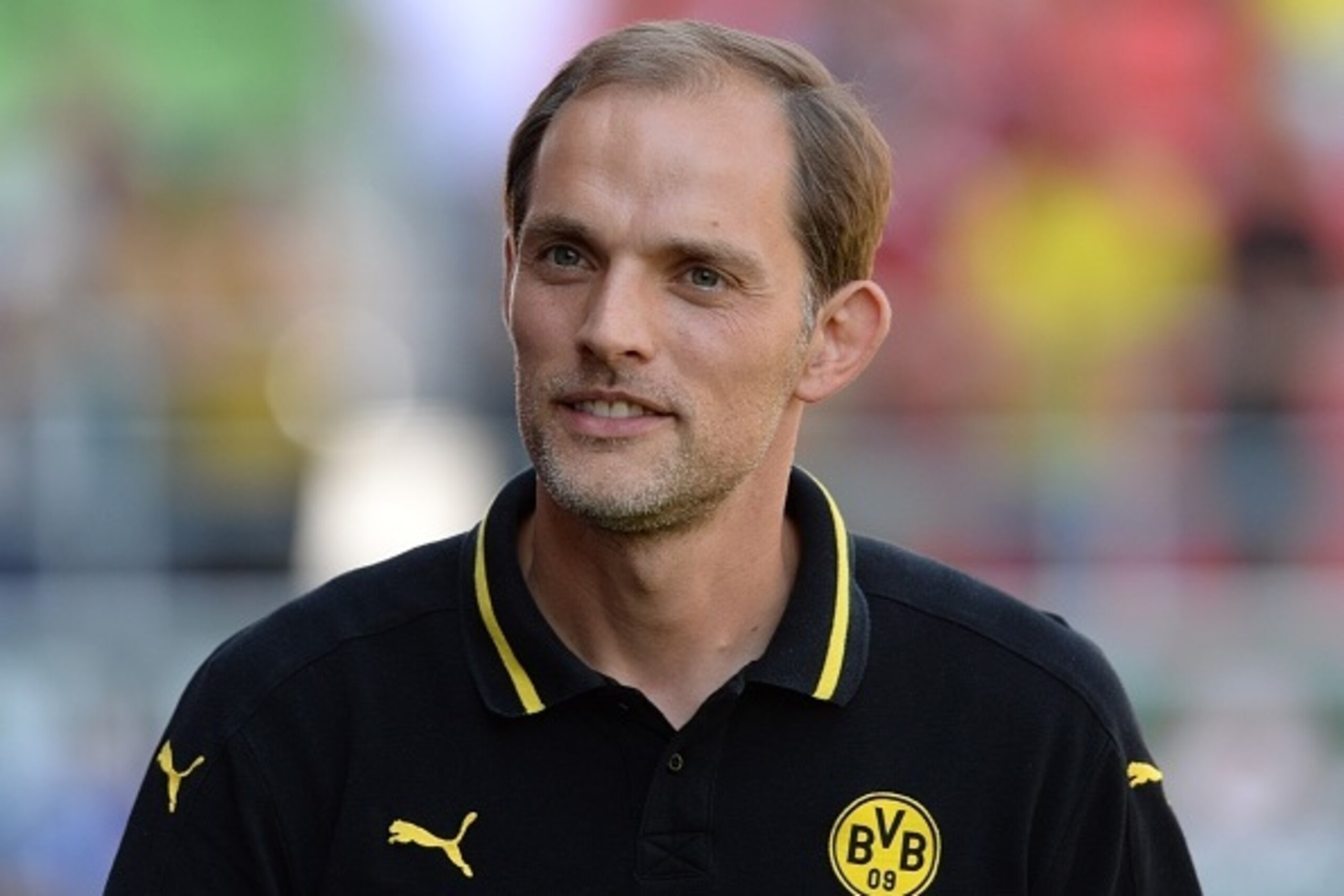 Dortmund's headcoach Thomas Tuchel looks on ahead of the German first division Bundesliga football match FC Ingolstadt 04 vs Borussia Dortmund, on August 23, 2015 in Ingolstadt, southern Germany.   AFP PHOTO / CHRISTOF STACHE

RESTRICTIONS: DURING MATCH T