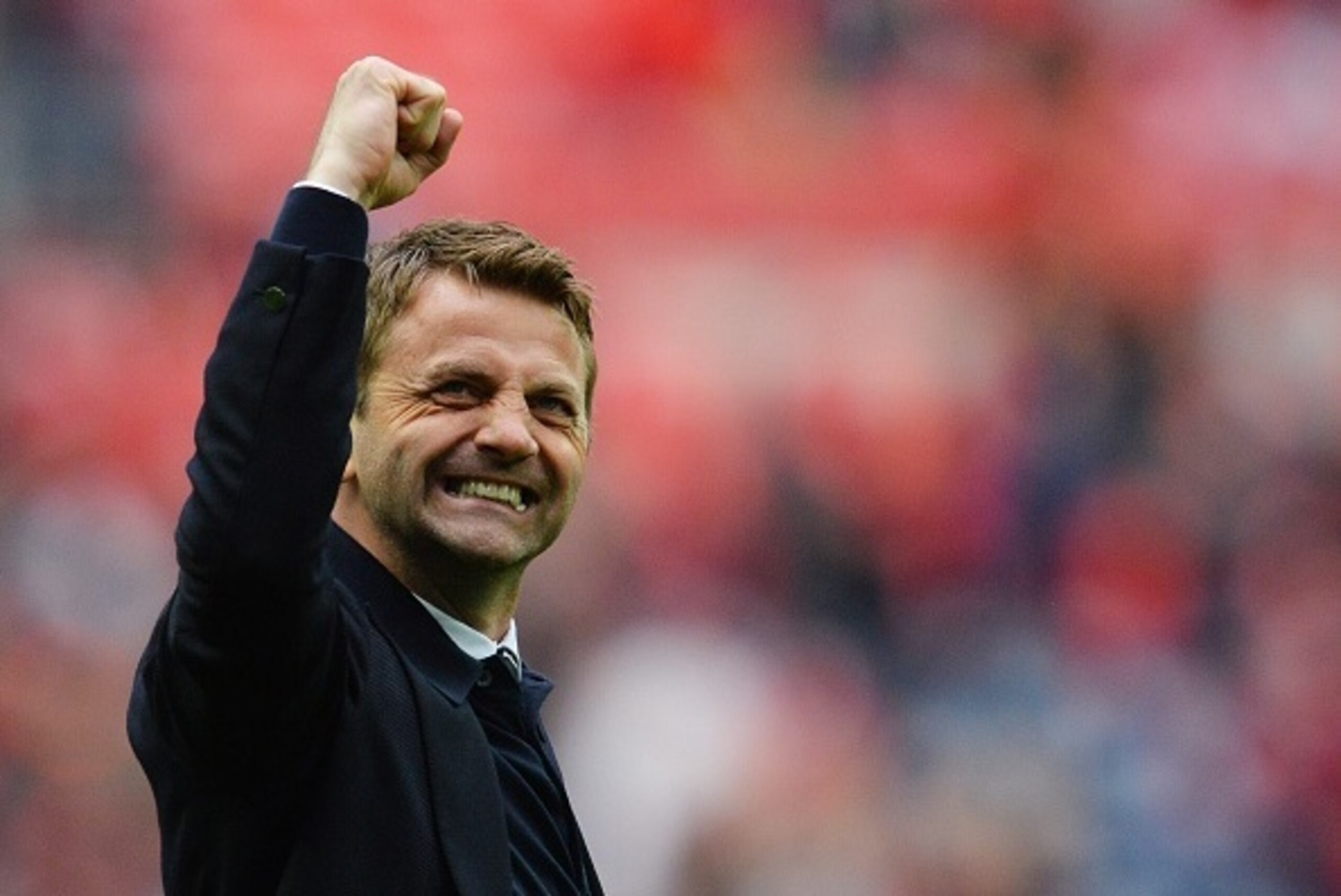 Aston Villa's English manager Tim Sherwood raises his fist after winning the FA Cup semi-final between Aston Villa and Liverpool at Wembley stadium in London on April 19, 2015.
AFP PHOTO / GLYN KIRK
NOT FOR MARKETING OR ADVERTISING USE / RESTRICTED TO EDI
