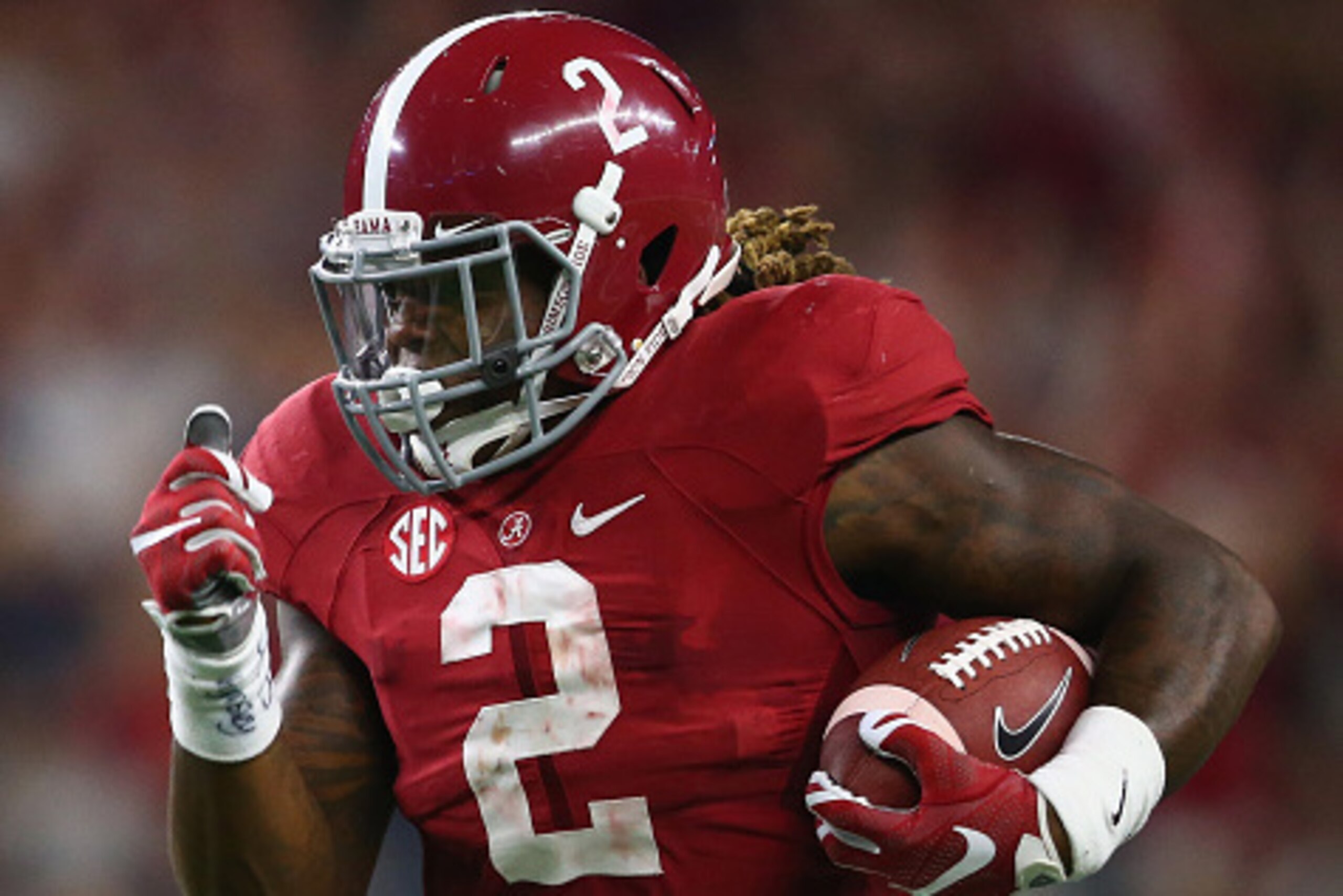 ARLINGTON, TX - SEPTEMBER 05:  Derrick Henry #2 of the Alabama Crimson Tide runs for a touchdown against the Wisconsin Badgers in the third quarter during the Advocare Classic at AT&T Stadium on September 5, 2015 in Arlington, Texas.  (Photo by Ronald Mar