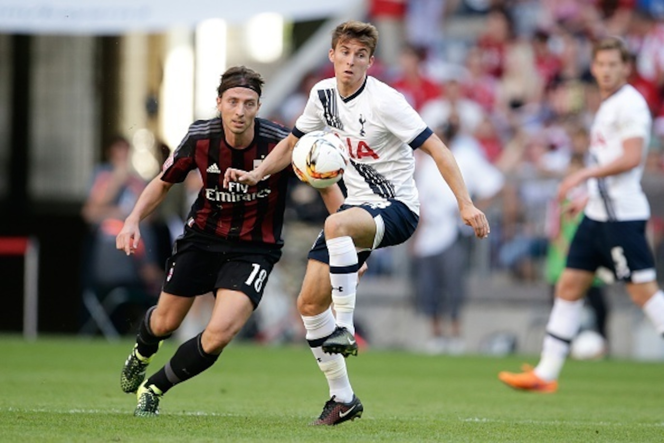 (L-R) Riccardo Montolivo of AC Milan, Tom Carroll of Tottenham Hotspur during the AUDI Cup bronze final match between Tottenham Hotspur and AC Milan on August 5, 2015 at the Allianz Arena in Munich, Germany(Photo by VI Images via Getty Images)