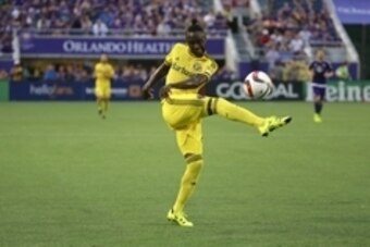 Aug 1, 2015; Orlando, FL, USA; Columbus Crew forward Kei Kamara (23) kicks the ball against the Orlando City SC during the first half at Orlando Citrus Bowl Stadium. Mandatory Credit: Kim Klement-USA TODAY Sports
