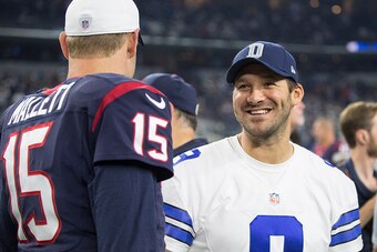 ARLINGTON, TX - SEPTEMBER 3:  Tony Romo #9 of the Dallas Cowboys talks with Ryan Mallett #15 of the Houston Texans after a preseason game at AT&T Stadium on September 3, 2015 in Arlington, Texas.  The Cowboys defeated the Texans 21-14.  (Photo by Wesley H
