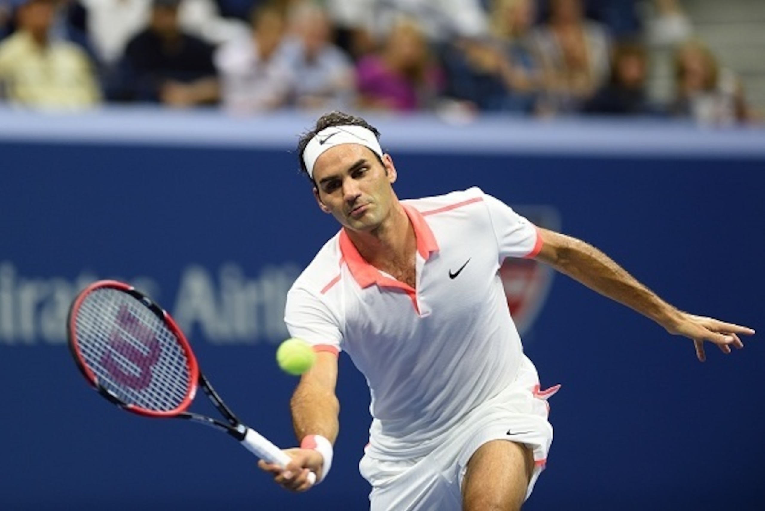 Roger Federer of Switzerland hits a return to  Richard Gasquet of France during their 2015 US Open men's singles quarterfinals match at the USTA Billie Jean King National Tennis Center on September 9, 2015  in New York. AFP PHOTO/DON EMMERT        (Photo 