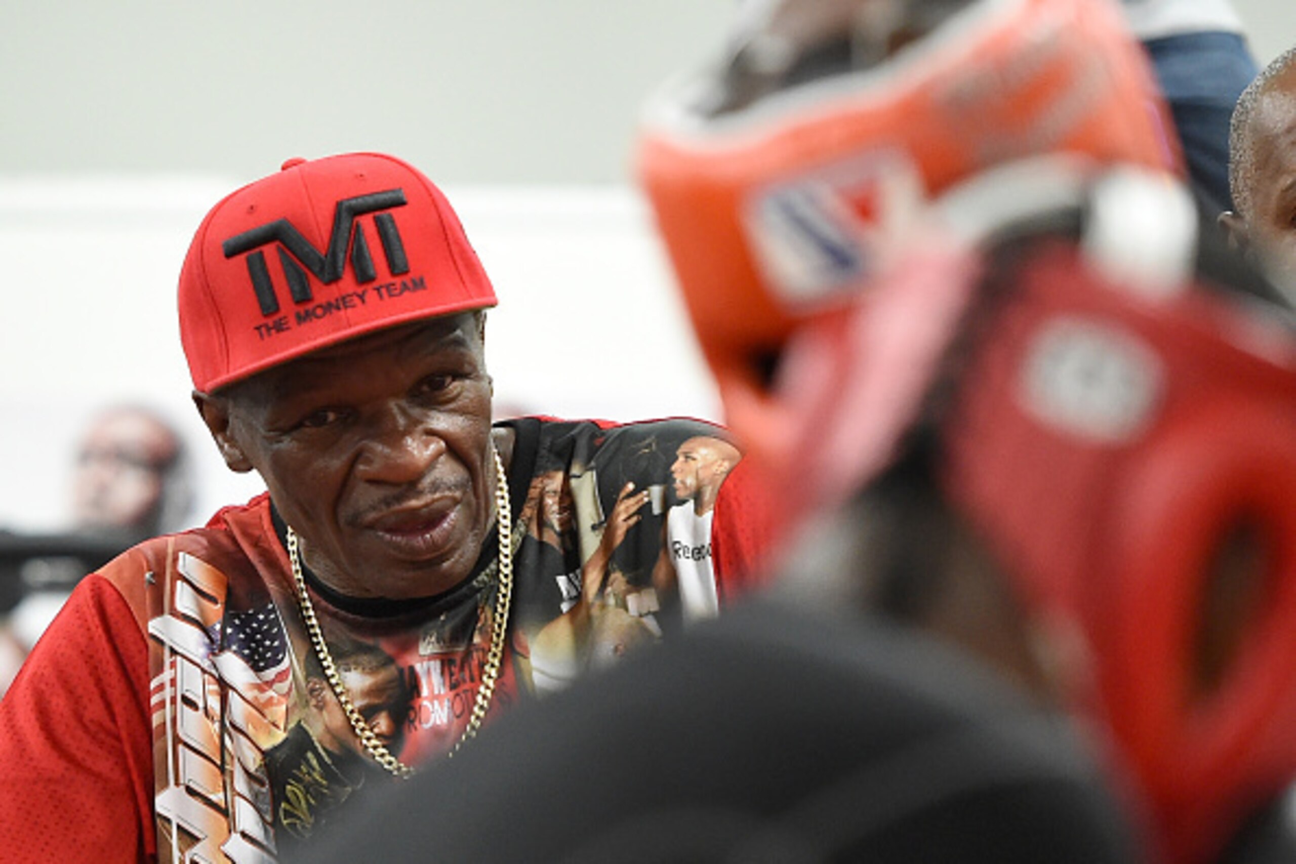LAS VEGAS, NV - AUGUST 26: Trainer Floyd Mayweather Sr. watches his son Floyd Mayweather Jr. during a media workout at the Mayweather Boxing Club on August 26, 2015 in Las Vegas, Nevada. Mayweather Jr. will defend his WBC/WBA welterweight titles against LAS VEGAS, NV - AUGUST 26: Trainer Floyd Mayweather Sr. watches his son Floyd Mayweather Jr. during a media workout at the Mayweather Boxing Club on August 26, 2015 in Las Vegas, Nevada. Mayweather Jr. will defend his WBC/WBA welterweight titles against