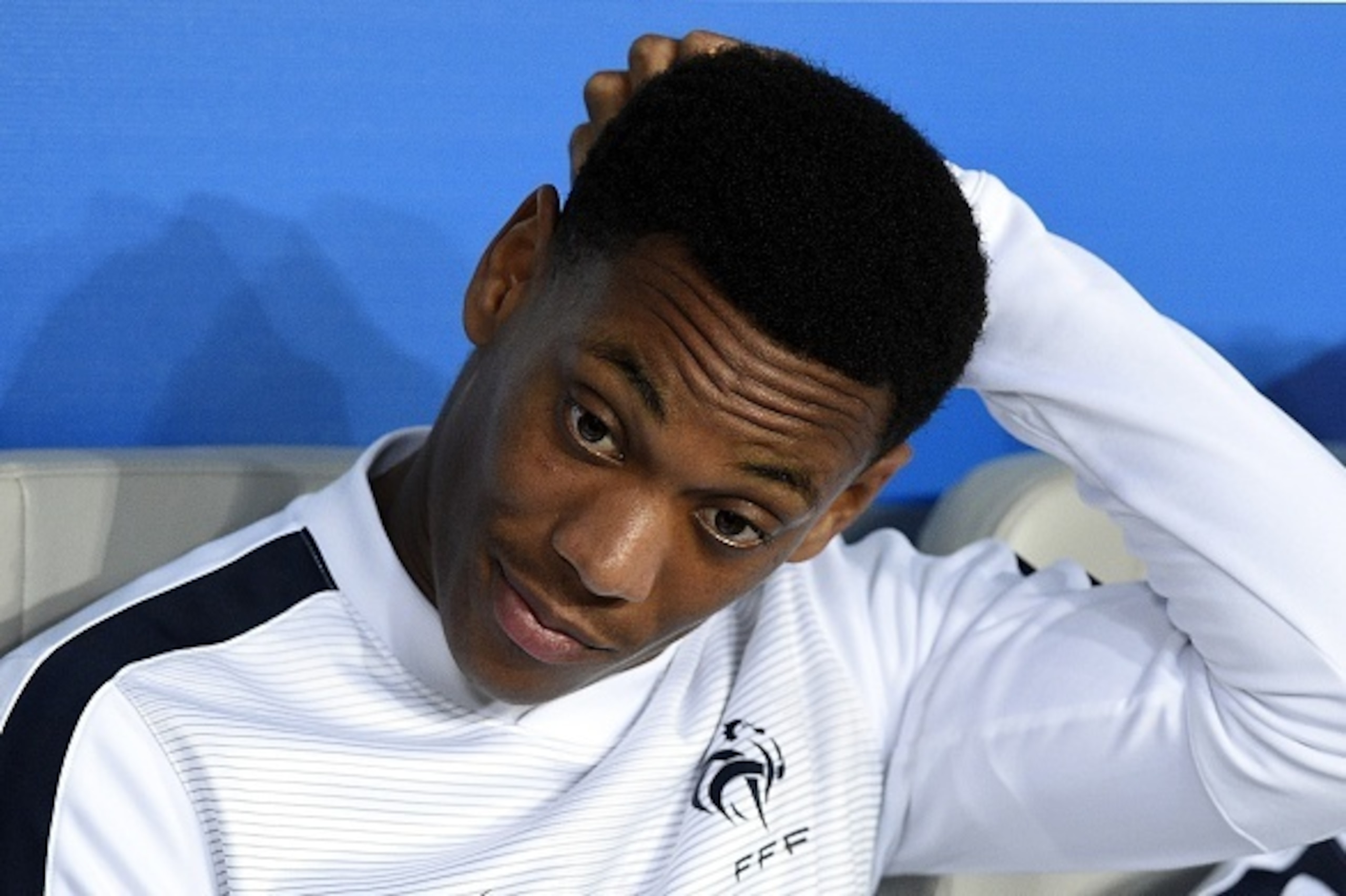 France's forward Anthony Martial sits on the bench during the Euro 2016 friendly football match France vs Serbia on September 7, 2015, at the Nouveau Stade stadium, in Bordeaux, western France. AFP PHOTO / FRANCK FIFE (Photo credit should read FR France's forward Anthony Martial sits on the bench during the Euro 2016 friendly football match France vs Serbia on September 7, 2015, at the Nouveau Stade stadium, in Bordeaux, western France. AFP PHOTO / FRANCK FIFE (Photo credit should read FR
