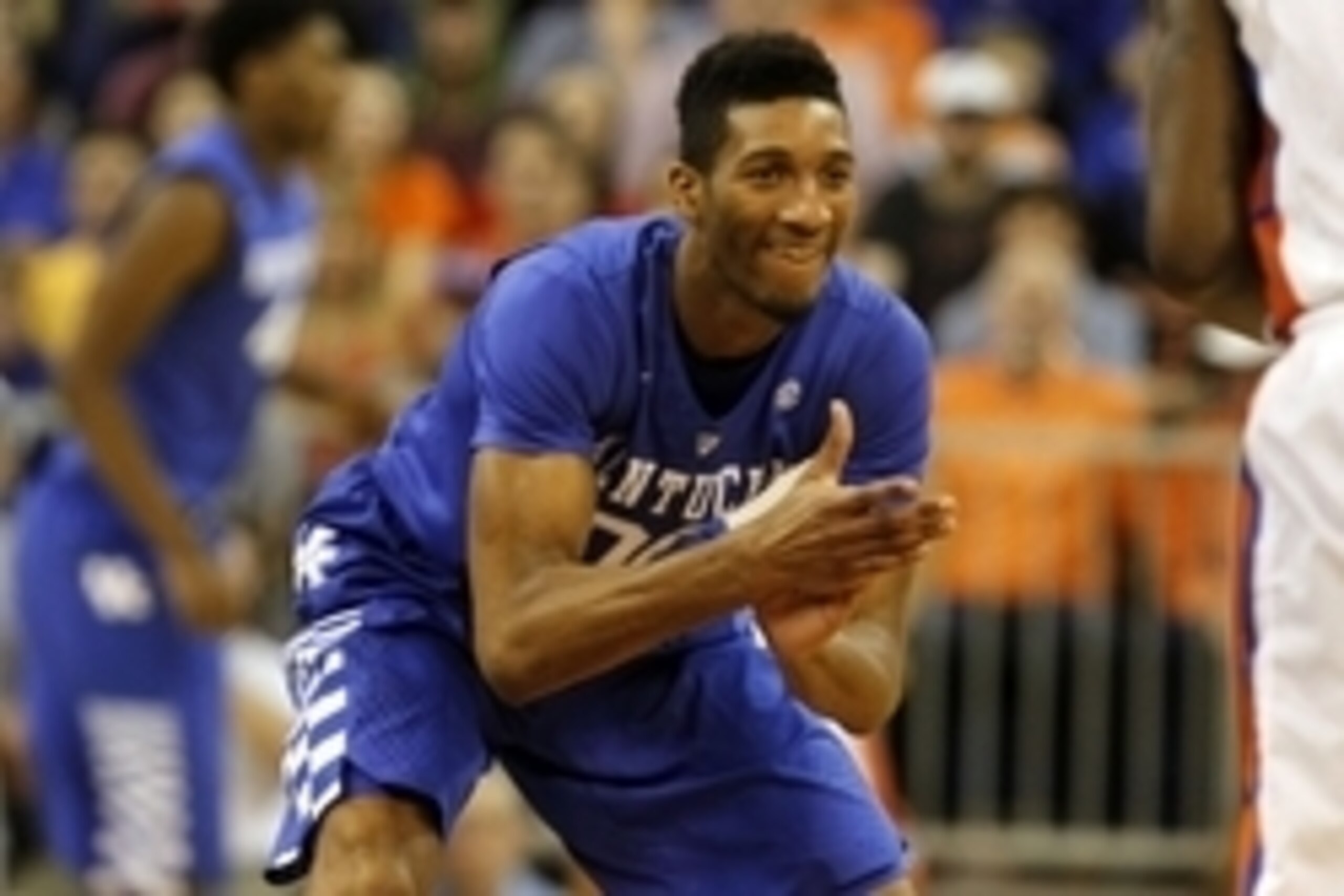 Feb 7, 2015; Gainesville, FL, USA; Kentucky Wildcats forward Marcus Lee (00) claps his hands against the Florida Gators during the second half at Stephen C. O'Connell Center. Kentucky Wildcats defeated the Florida Gators 68-61. Mandatory Credit: Kim Kleme