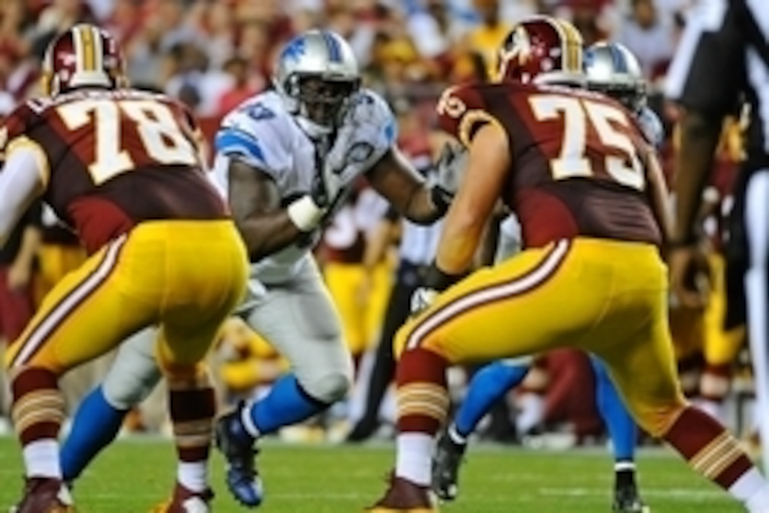 Aug 20, 2015; Landover, MD, USA; Detroit Lions defensive end Tyrunn Walker (93) rushes against Washington Redskins offensive tackle Brandon Scherff (75) during the first half at FedEx Field. Mandatory Credit: Brad Mills-USA TODAY Sports