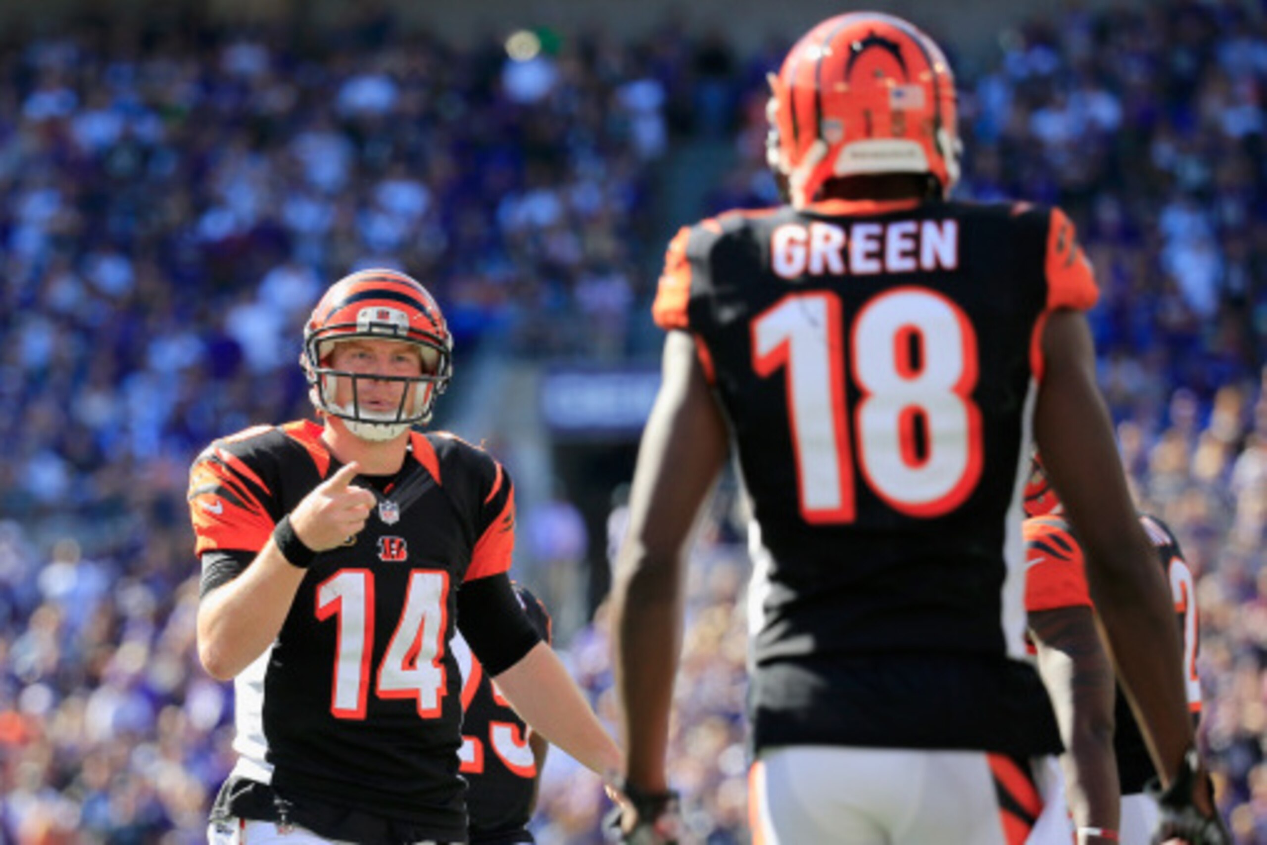 BALTIMORE, MD - SEPTEMBER 07: Quarterback Andy Dalton #14 of the Cincinnati Bengals celebrates with wide receiver A.J. Green #18 after Green's game winning touchdown during an NFL football game against the Baltimore Ravens at M&T Bank Stadium on September