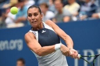 Sep 11, 2015; New York, NY, USA;  Flavia Pennetta of Italy hits to Simona Halep of Romania on day twelve of the 2015 U.S. Open tennis tournament at USTA Billie Jean King National Tennis Center. Mandatory Credit: Robert Deutsch-USA TODAY Sports