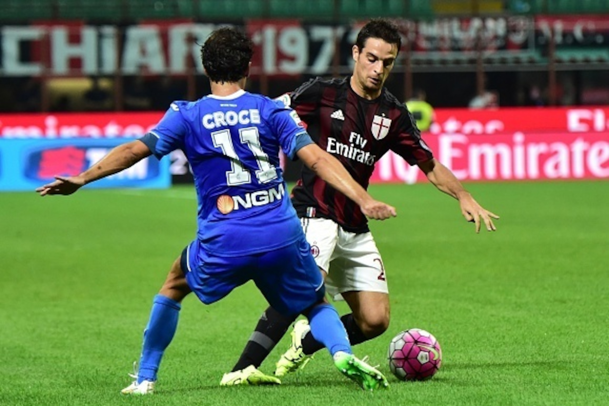 Empoli's midfielder from Italy Daniele Croce (L) fights for the ball with AC Milan's midfielder from Italy Giacomo Bonaventura during the Italian Serie A football match between AC Milan and Empoli at San Siro Stadium in Milan on August 29, 2015. AFP PHOT Empoli's midfielder from Italy Daniele Croce (L) fights for the ball with AC Milan's midfielder from Italy Giacomo Bonaventura during the Italian Serie A football match between AC Milan and Empoli at San Siro Stadium in Milan on August 29, 2015. AFP PHOT