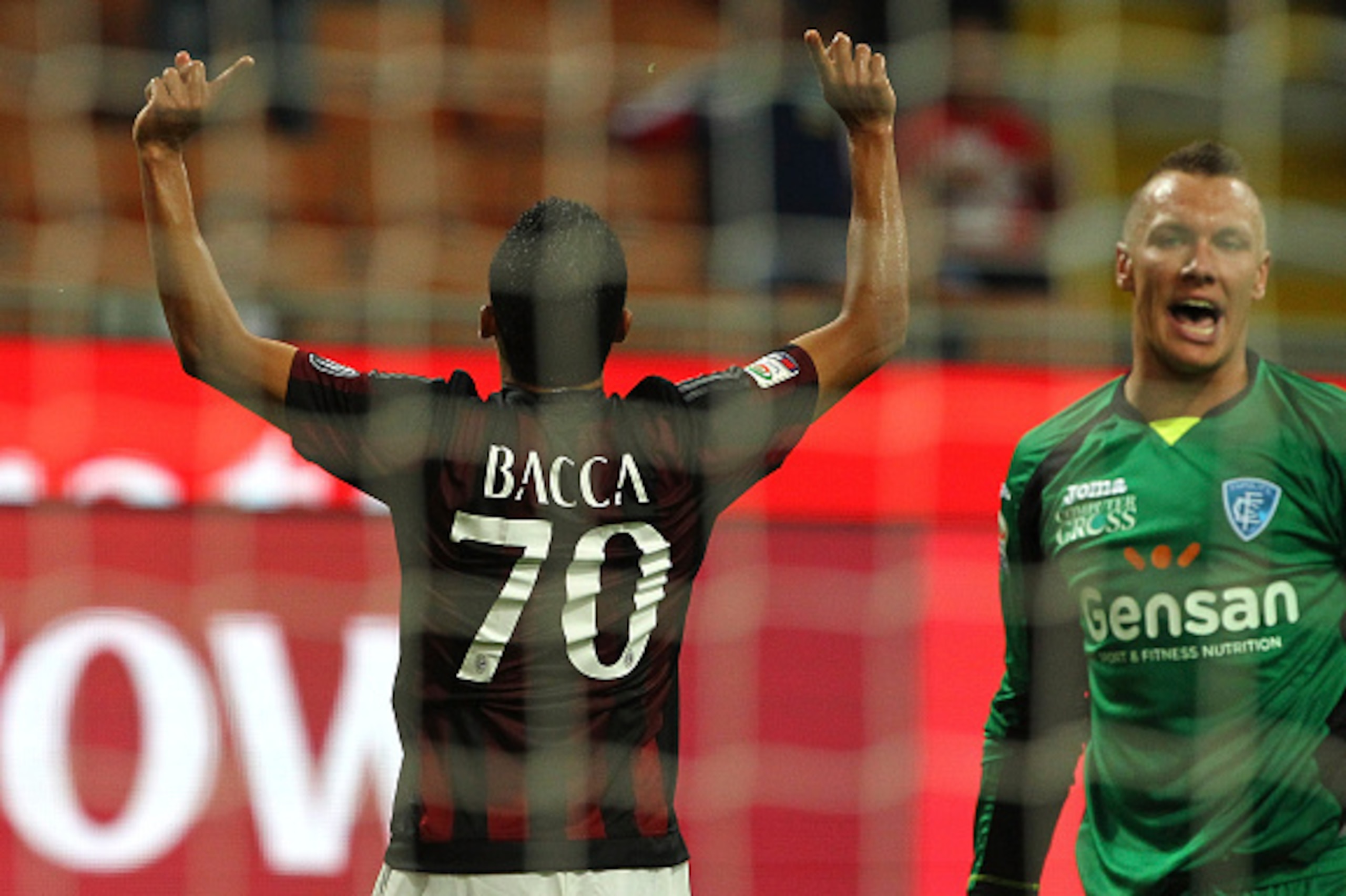MILAN, ITALY - AUGUST 29: Carlos Bacca of AC Milan celebrates after scoring the opening goal during the Serie A match between AC Milan and Empoli FC at Stadio Giuseppe Meazza on August 29, 2015 in Milan, Italy. (Photo by Marco Luzzani/Getty Images) MILAN, ITALY - AUGUST 29: Carlos Bacca of AC Milan celebrates after scoring the opening goal during the Serie A match between AC Milan and Empoli FC at Stadio Giuseppe Meazza on August 29, 2015 in Milan, Italy. (Photo by Marco Luzzani/Getty Images)
