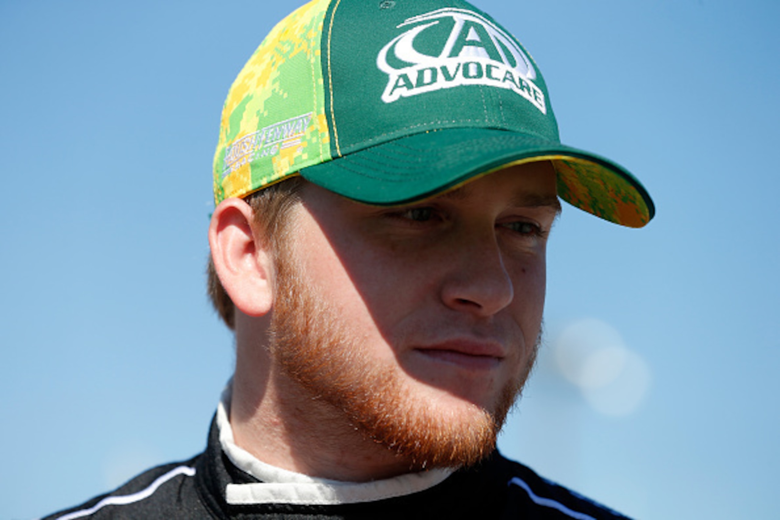 RICHMOND, VA - SEPTEMBER 11:  Chris Buescher, driver of the #60 AdvoCare Ford, stands on the grid during qualifying for the NASCAR XFINITY Series Virginia529 College Savings 250 at Richmond International Raceway on September 11, 2015 in Richmond, Virginia