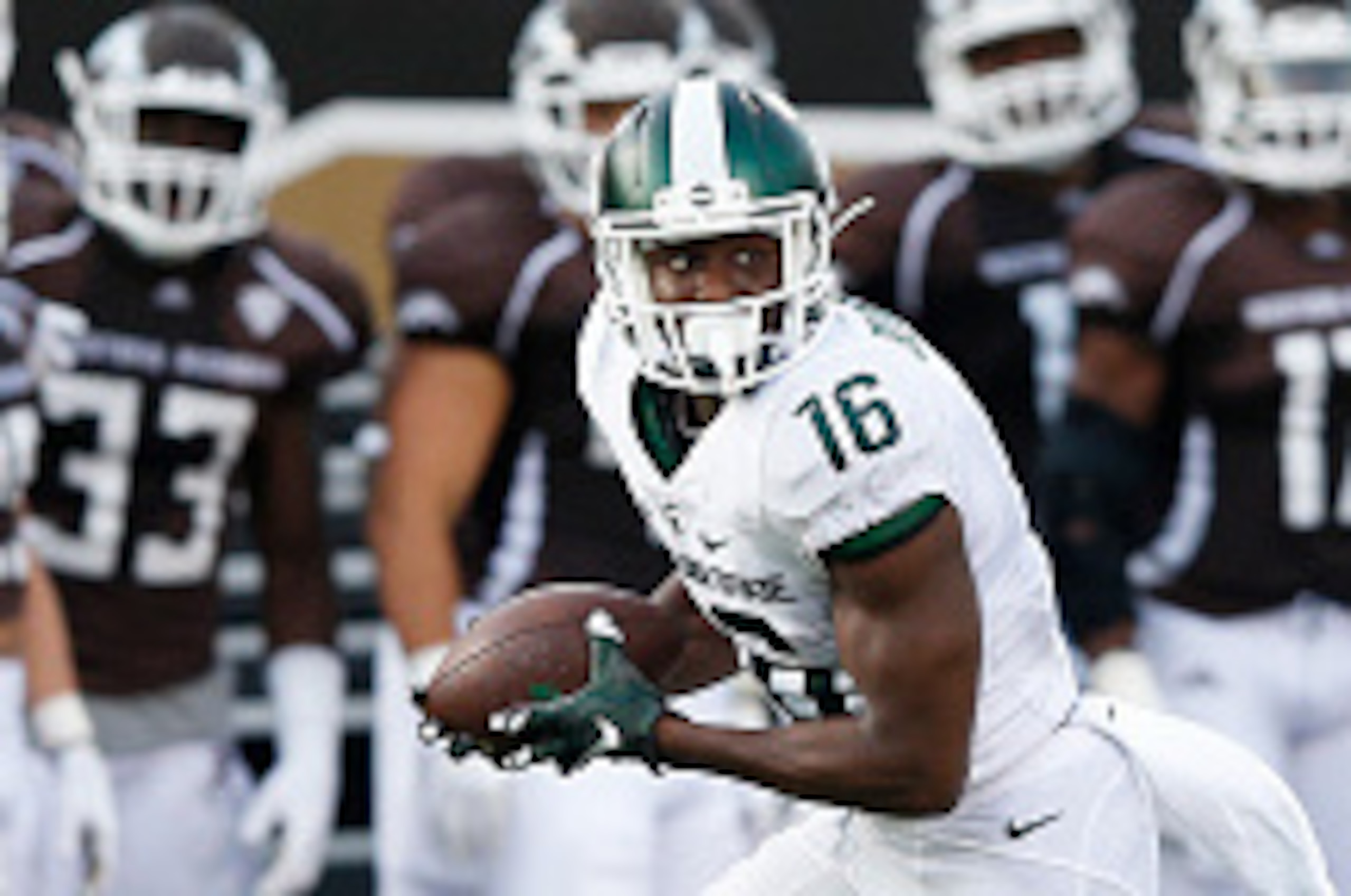 KALAMAZOO, MI - SEPTEMBER 4: Aaron Burbridge #16 of the Michigan State Spartans runs after a reception against the Western Michigan Broncos during the game at Waldo Stadium on September 4, 2015 in Kalamazoo, Michigan. The Spartans defeated the Broncos 37-