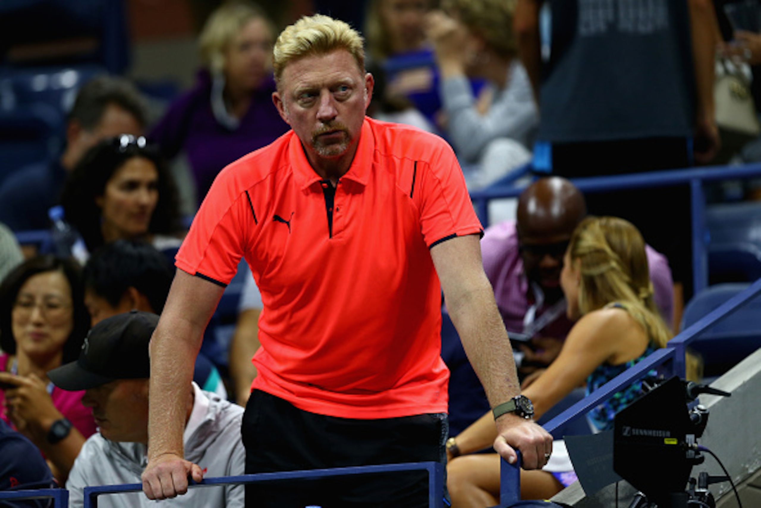 NEW YORK, NY - SEPTEMBER 06:  Boris Becker coach of Novak Djokovic of Serbia watches him play against Roberto Bautista Agut of Spain in their mens singles fourth round match on Day Seven of the 2015 US Open at the USTA Billie Jean King National Tennis Cen