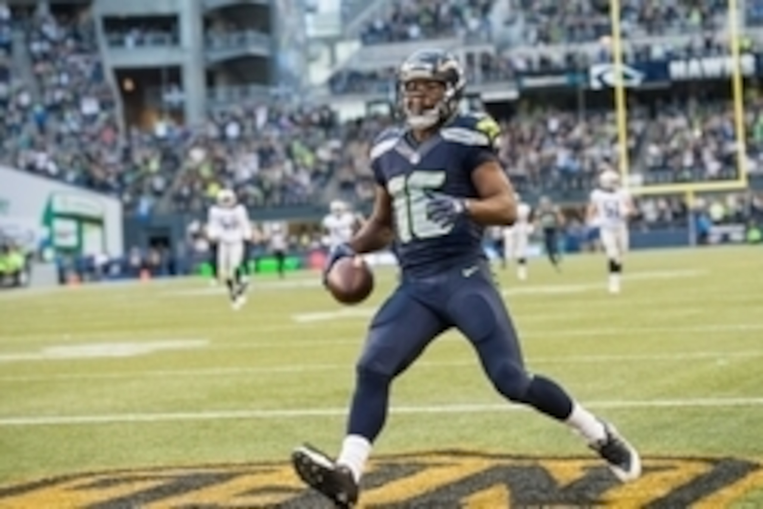 Sep 3, 2015; Seattle, WA, USA;  Seattle Seahawks wide receiver Tyler Lockett (16) scores a touchdown on a pass reception during the first quarter at CenturyLink Field. Mandatory Credit: Troy Wayrynen-USA TODAY Sports