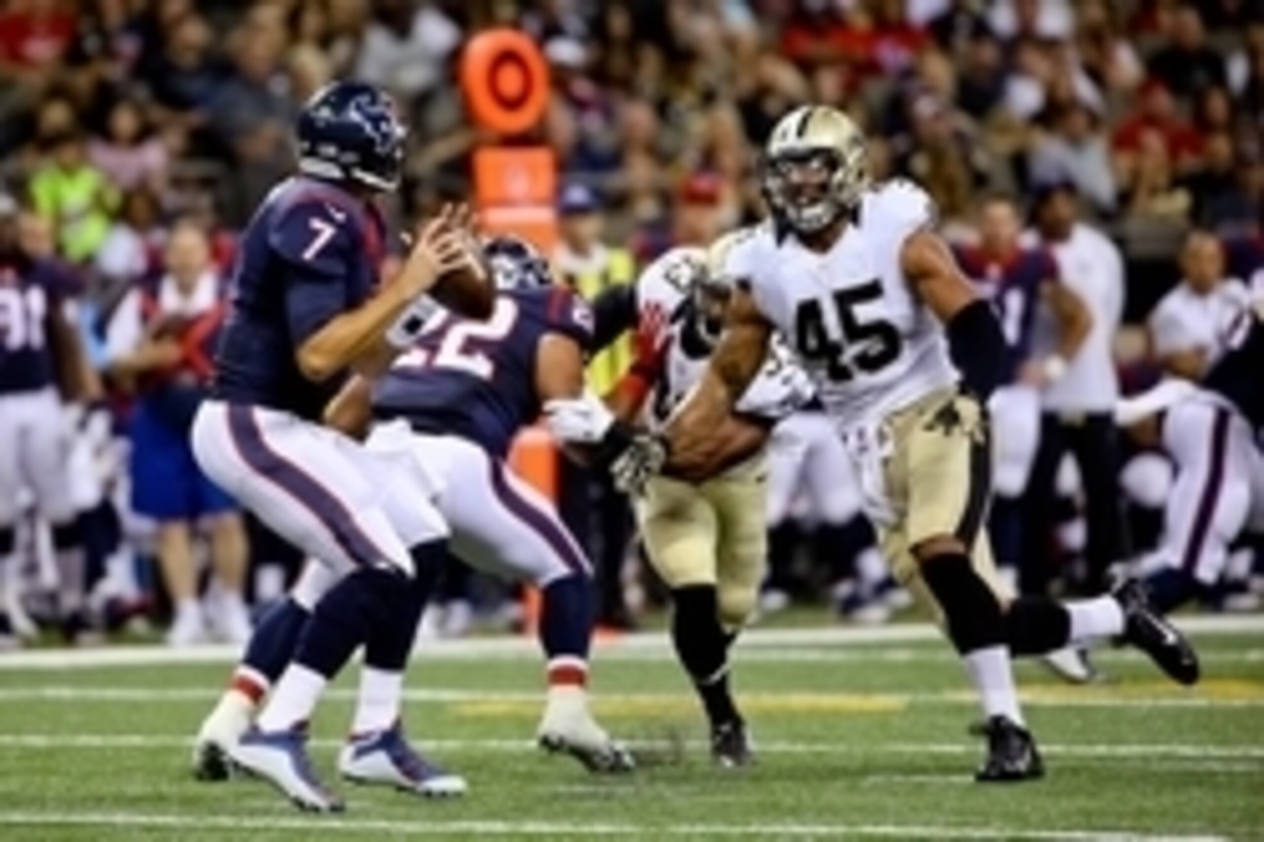 Aug 30, 2015; New Orleans, LA, USA; New Orleans Saints outside linebacker Hau'oli Kikaha (45) pressures Houston Texans quarterback Brian Hoyer (7) during the first half of a preseason game at the Mercedes-Benz Superdome. Mandatory Credit: Derick E. Hingle